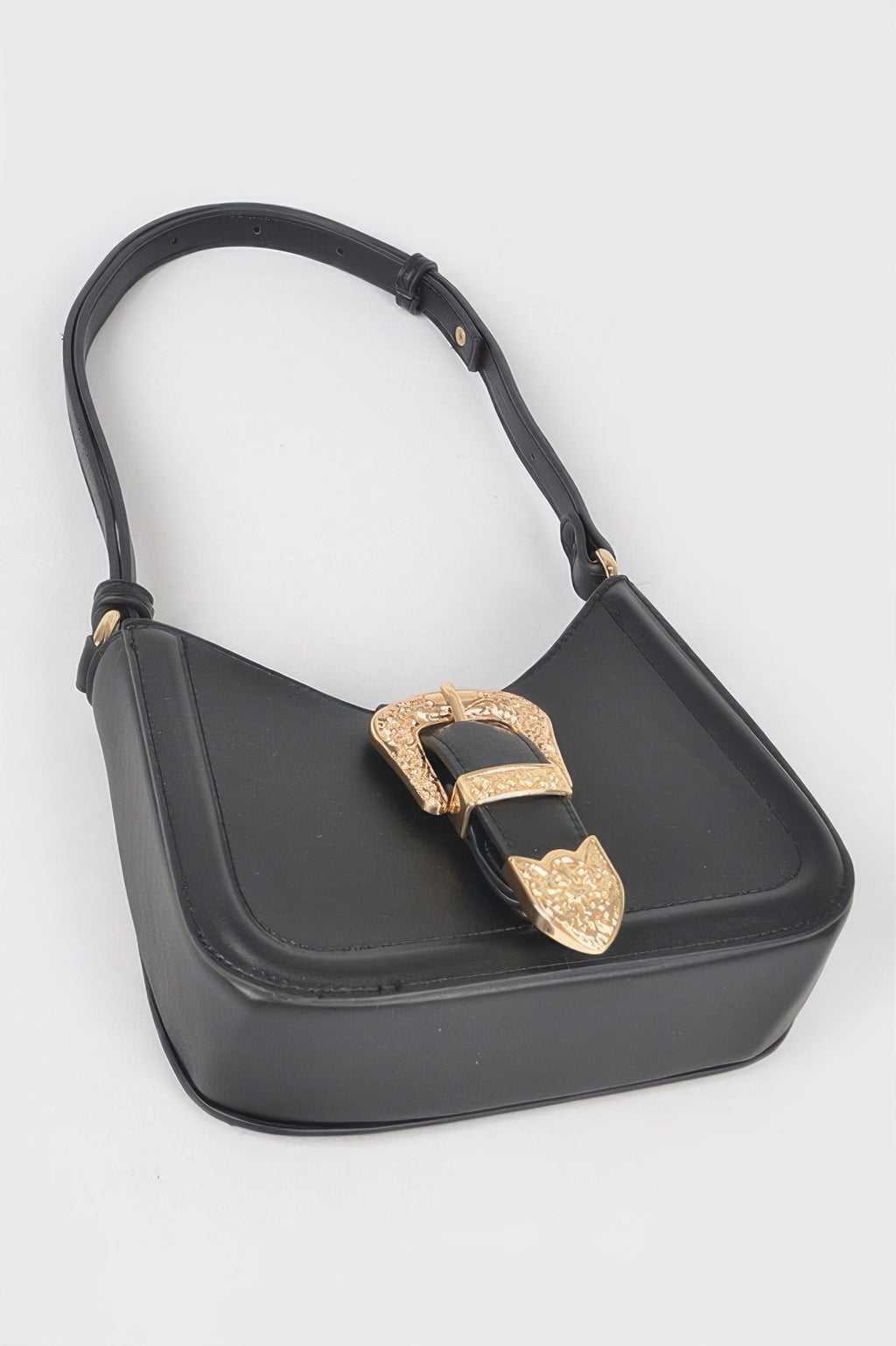 Black vegan shoulder bag front with gold-tone metal buckle and curved top