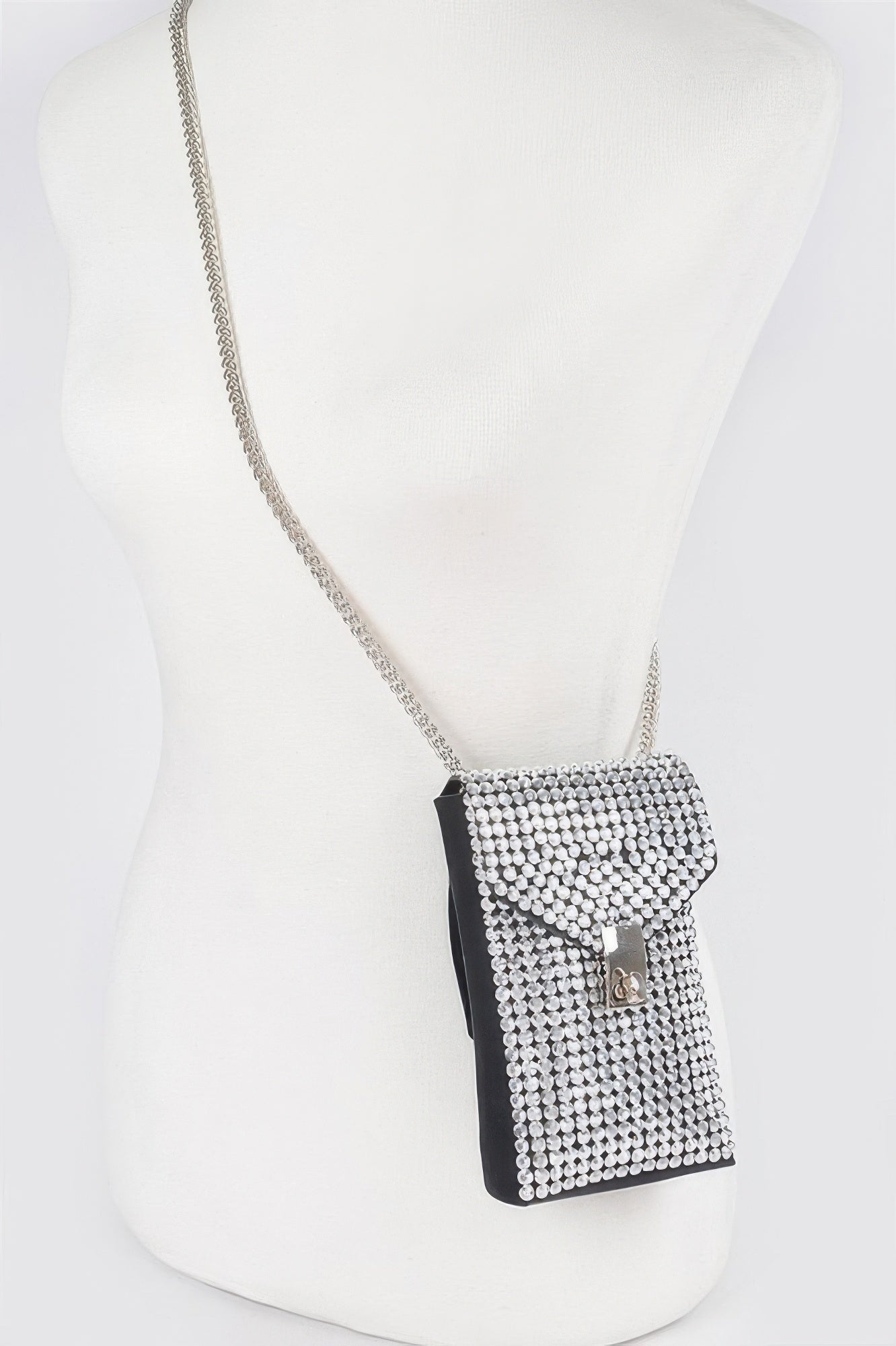 Silver rhinestone mini belt bag with black back and long chain strap