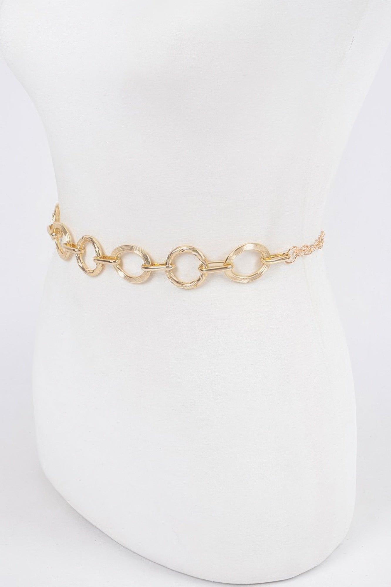 Gold round-link chain belt front view on mannequin