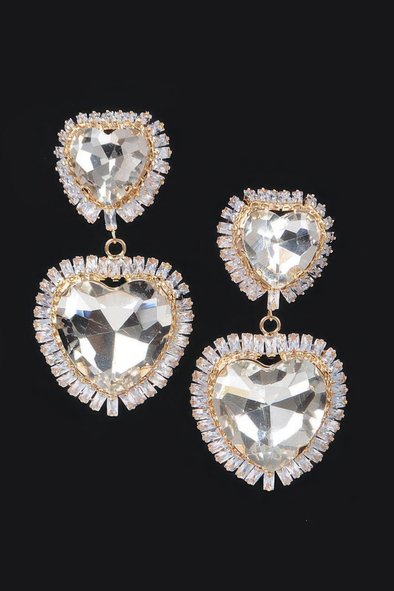 Cubic And Glass double heart earrings in gold tone with clear faceted heart stones