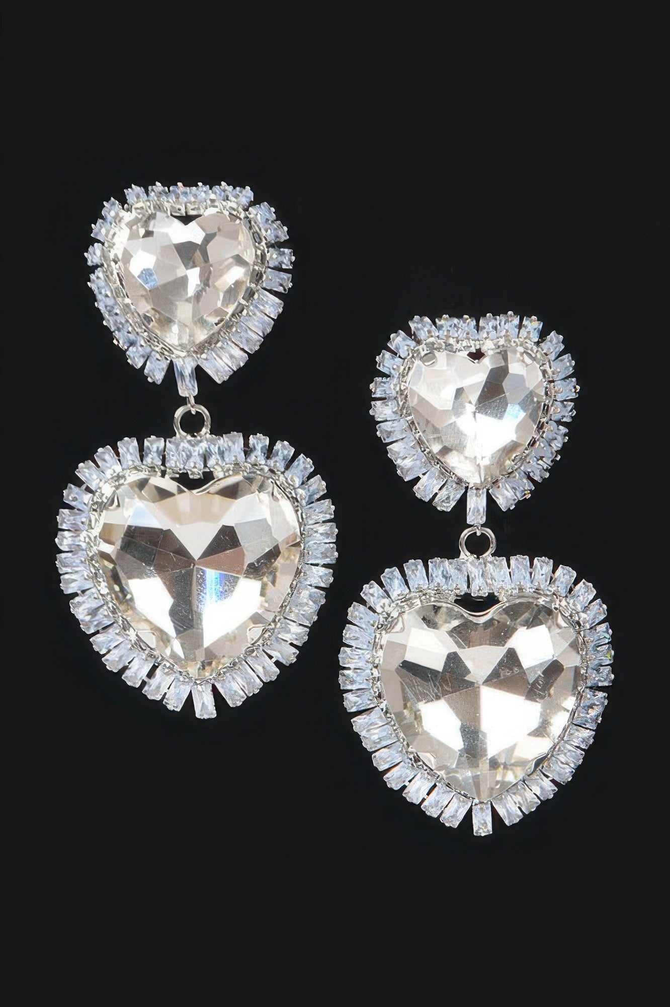 Cubic And Glass double heart earrings in clear silver tone with faceted heart stones