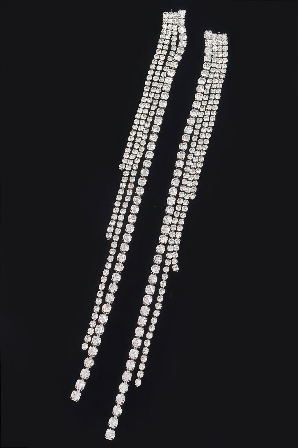 Long rhinestone drop earrings with multiple row settings, clear-silver finish