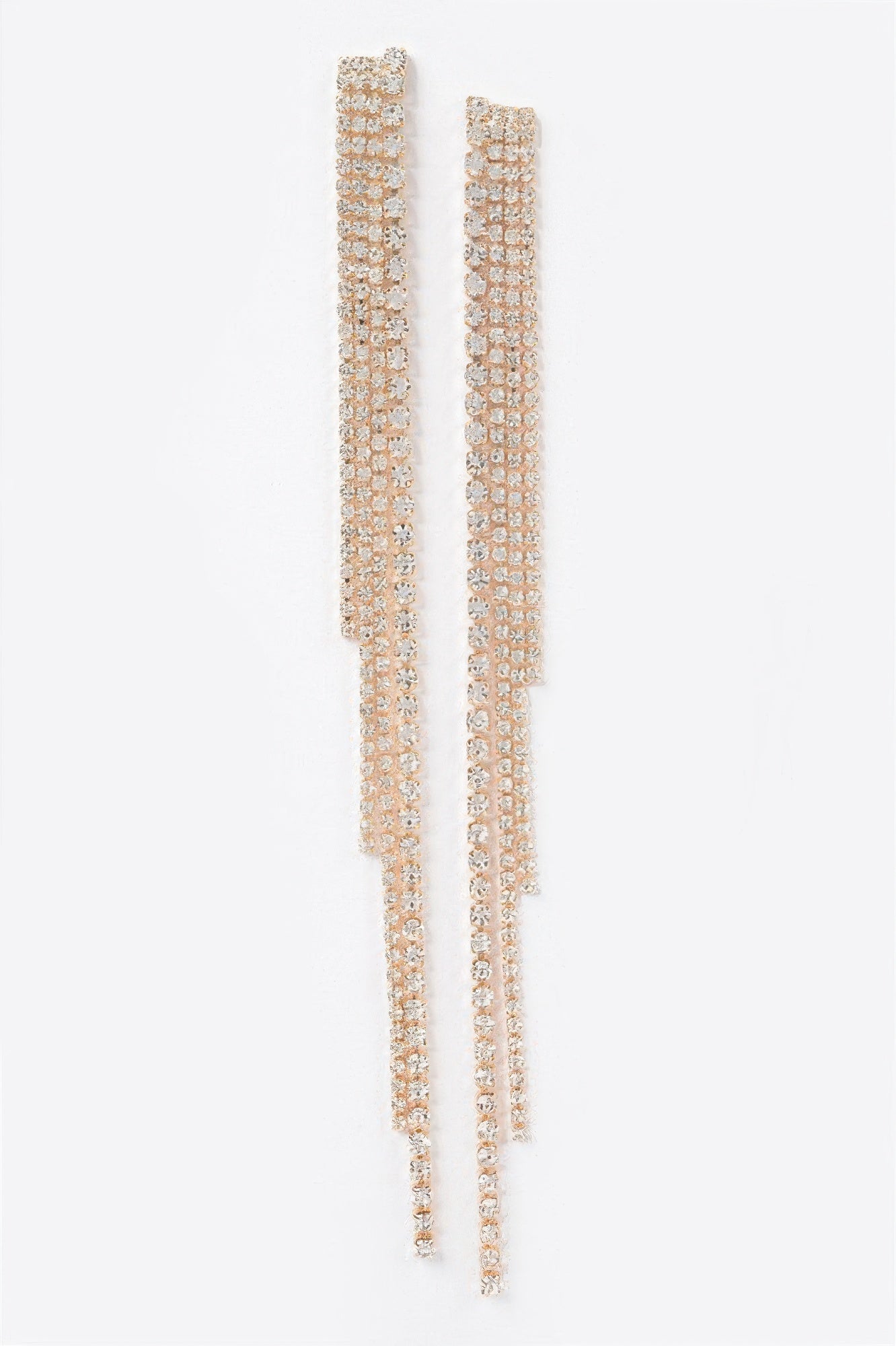 Long rhinestone string earrings in clear-gold tone, sparkly stacked rows