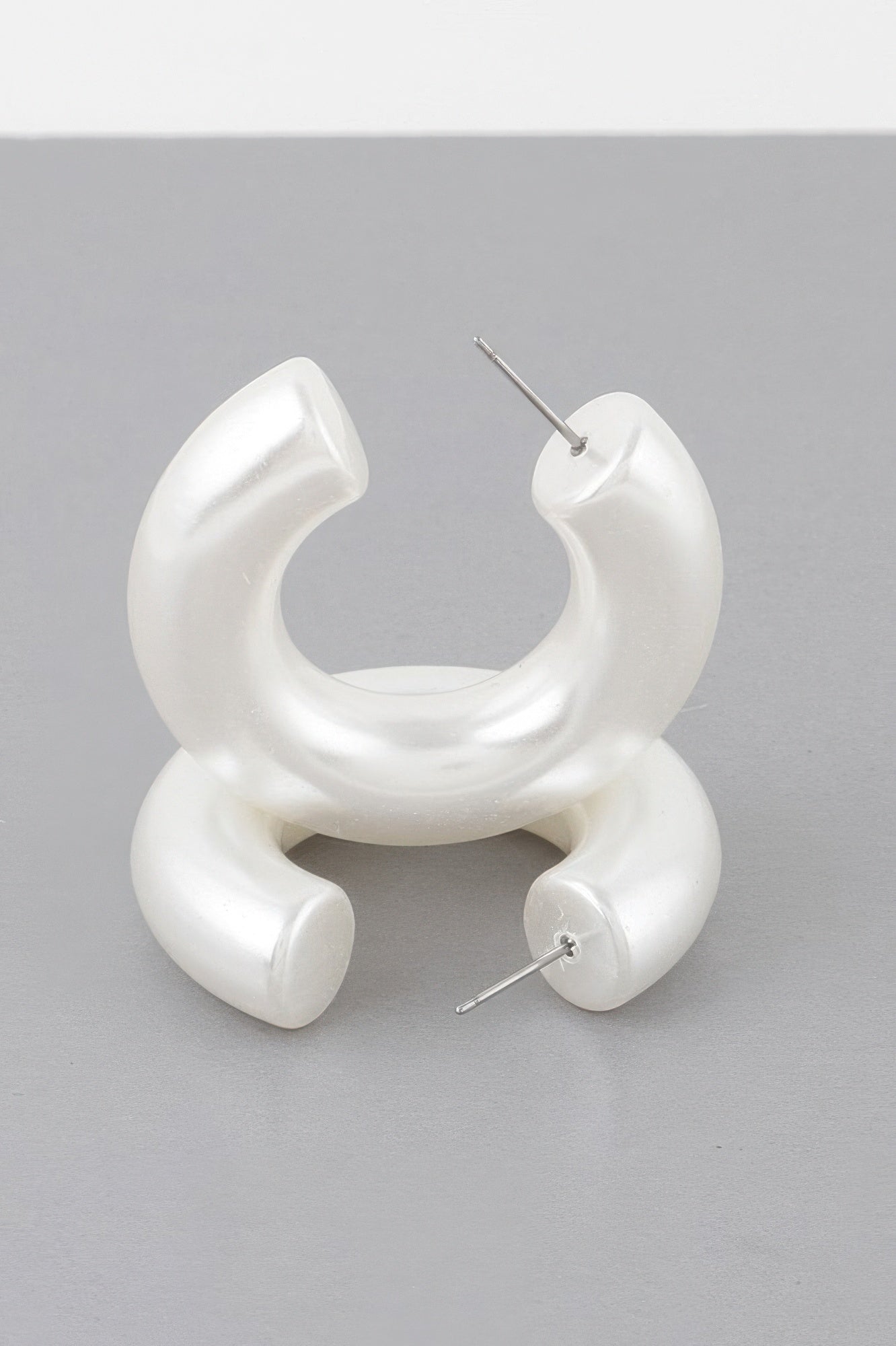 Cream oversized stacked polished hoop earrings with stud pins