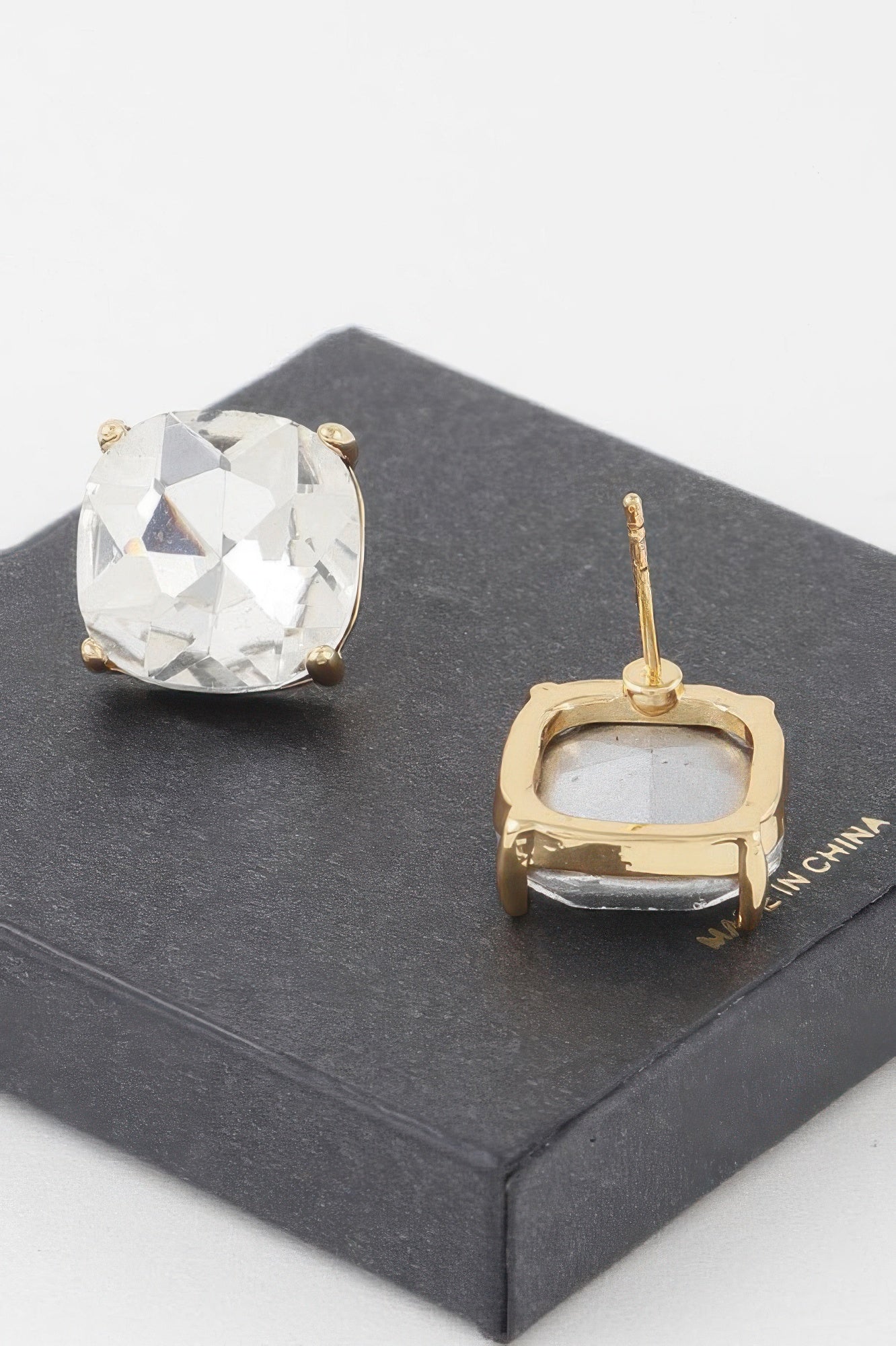 14k rhinestone stud earrings, gold-tone prong settings with clear faceted stones