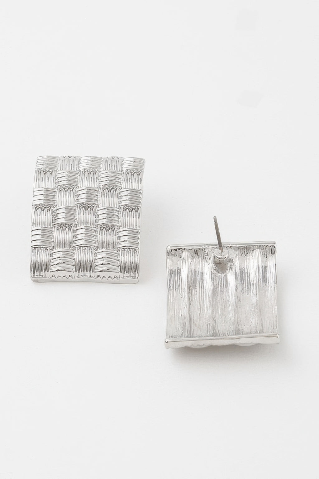 Cross Hatch Plate Earrings in silver-tone metal with square woven texture