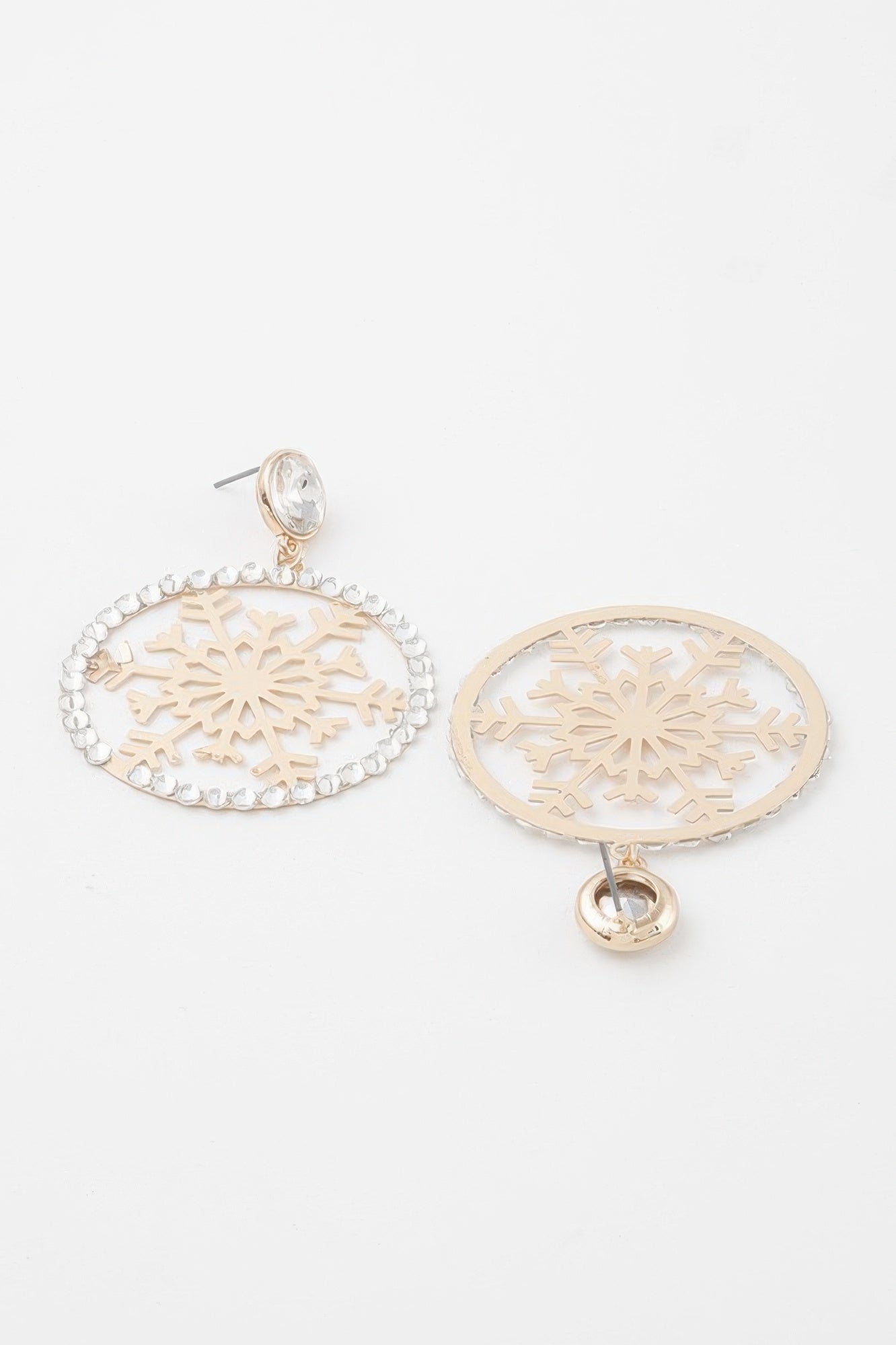 Jeweled snowflake earrings, gold-tone oval with clear round accents