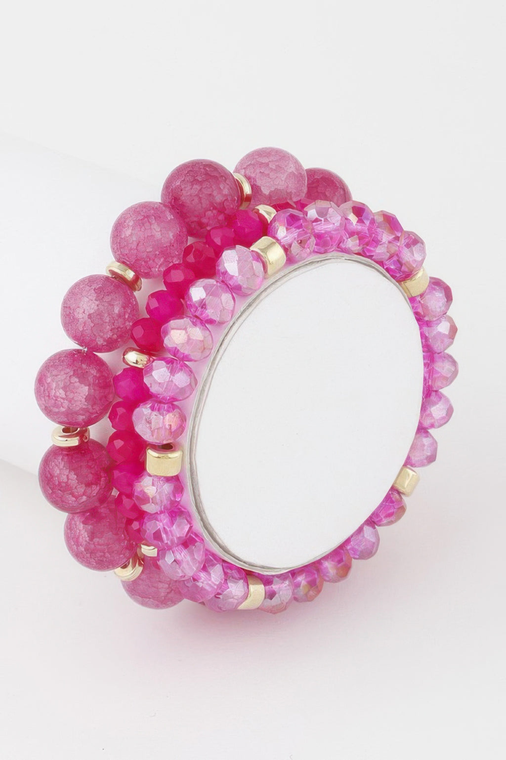 Triple crystal beaded bracelet in pink fuchsia with gold-tone accents