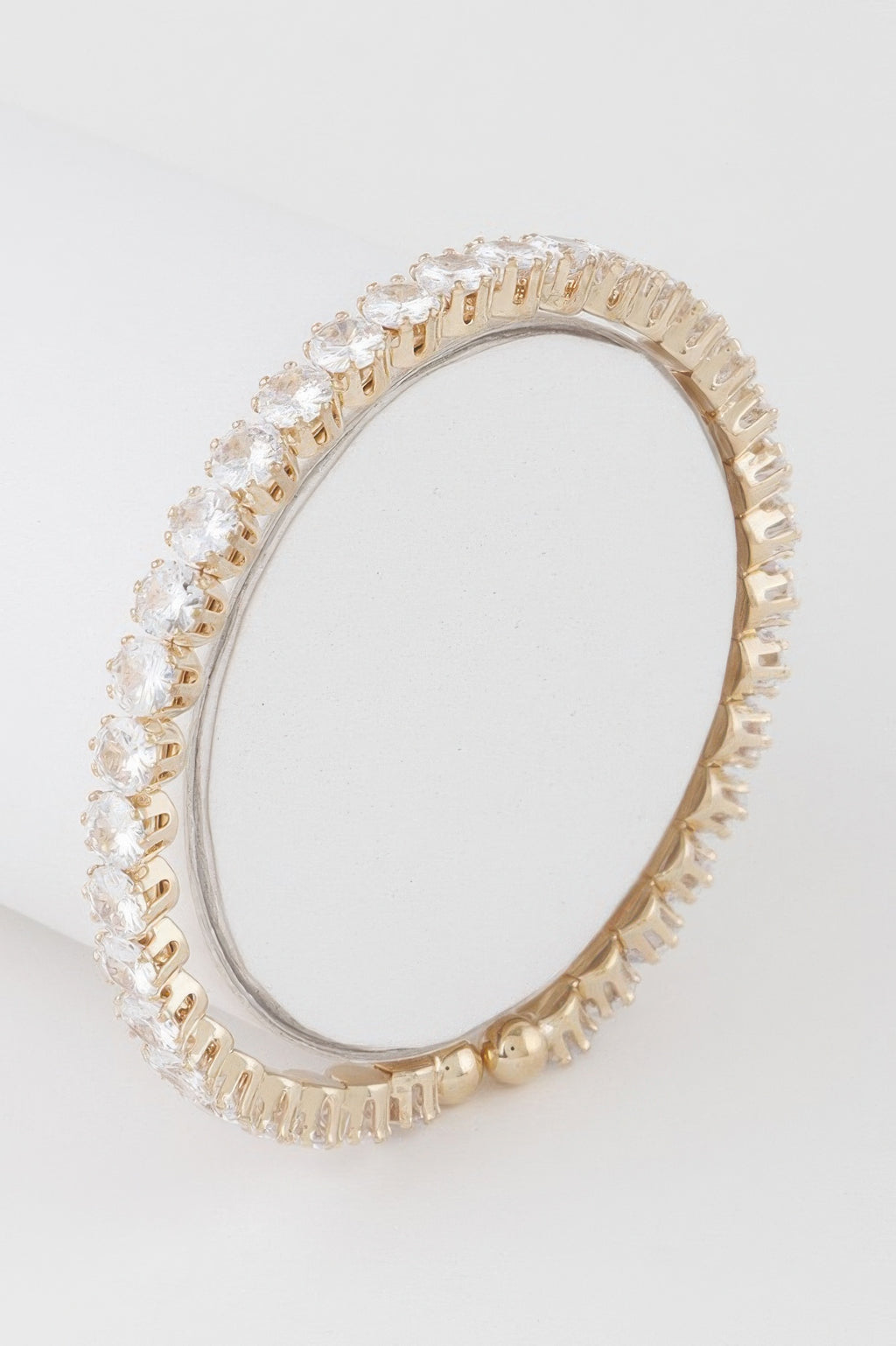 Rhinestone cuff bracelet, gold-tone with clear stones in a continuous circle