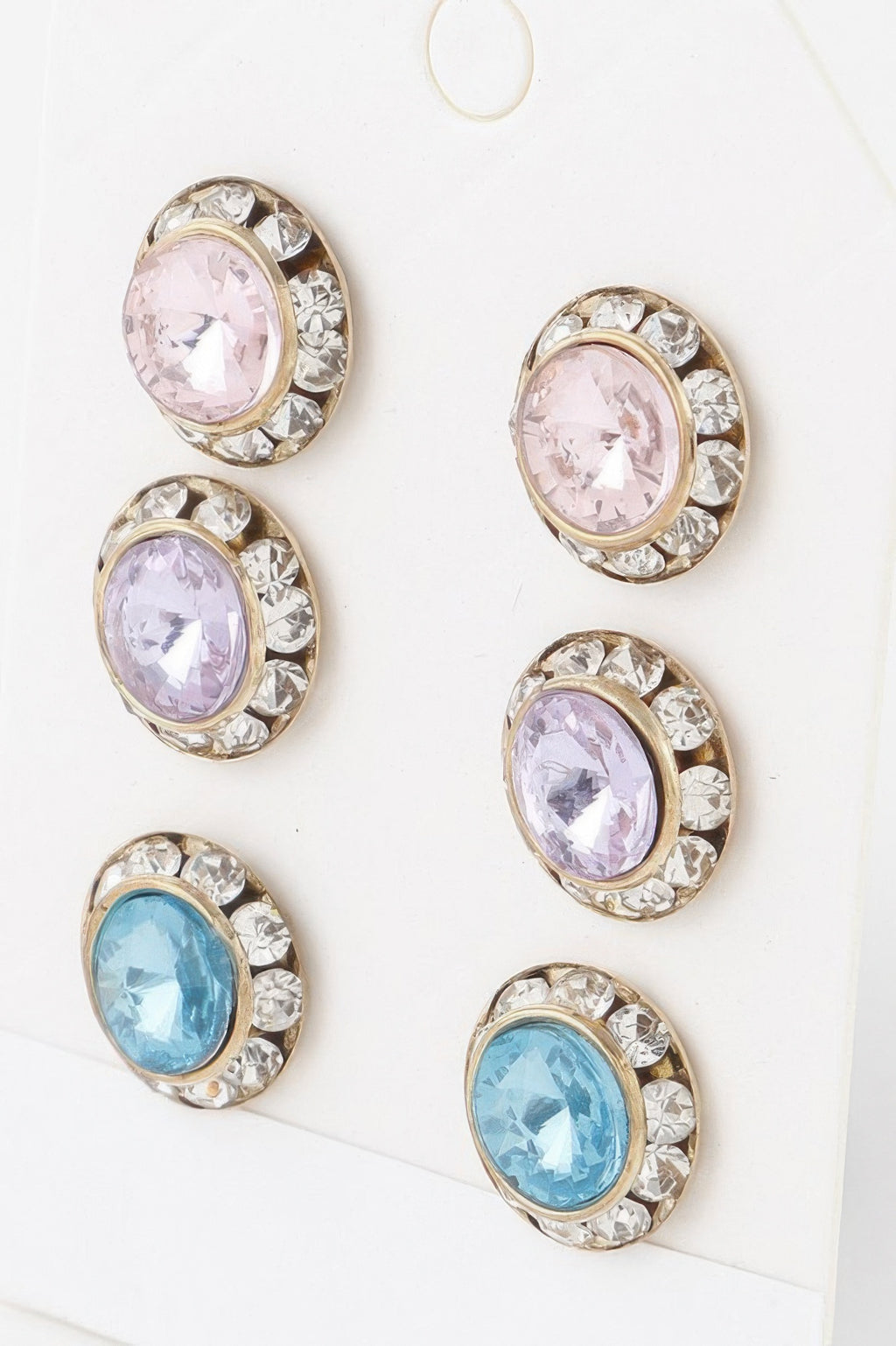Round multi-stone stud earrings—clear prong settings with pastel pink, lavender, and light blue gems