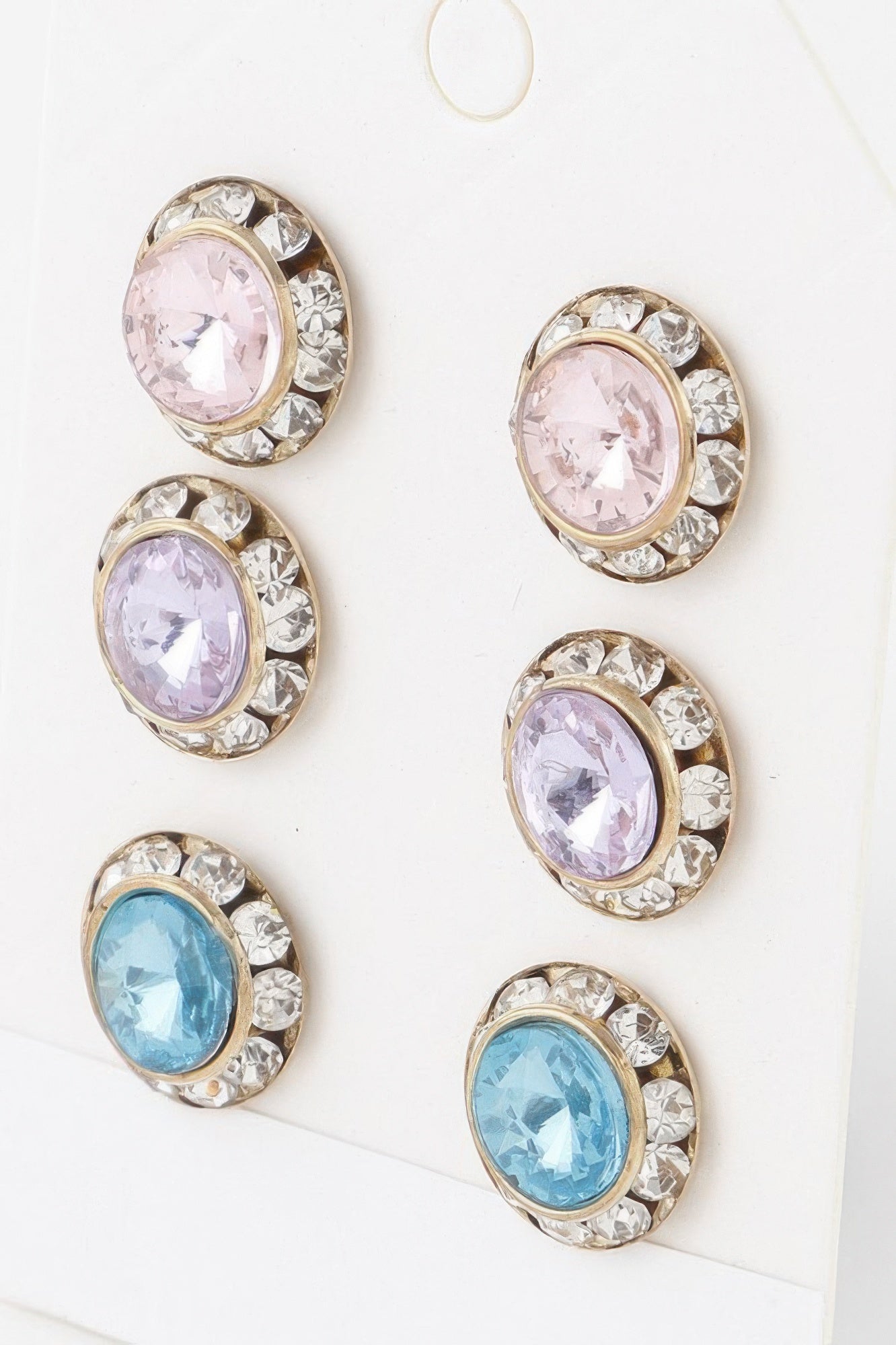 Round multi-stone stud earrings—clear prong settings with pastel pink, lavender, and light blue gems