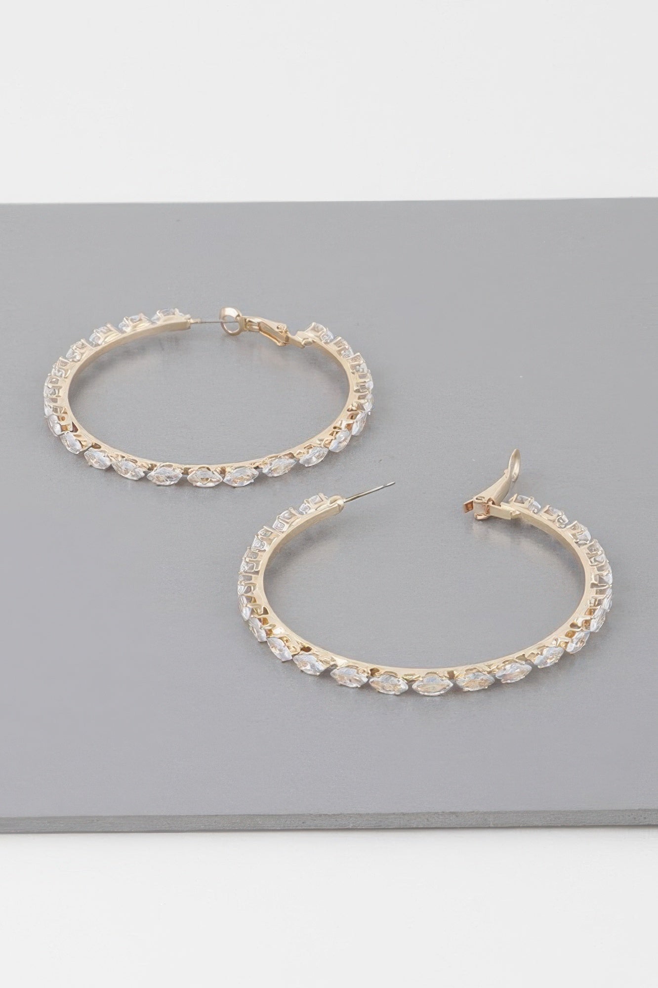 Petite jeweled hoop earrings, gold-tone clear-stone hoops with latch closure