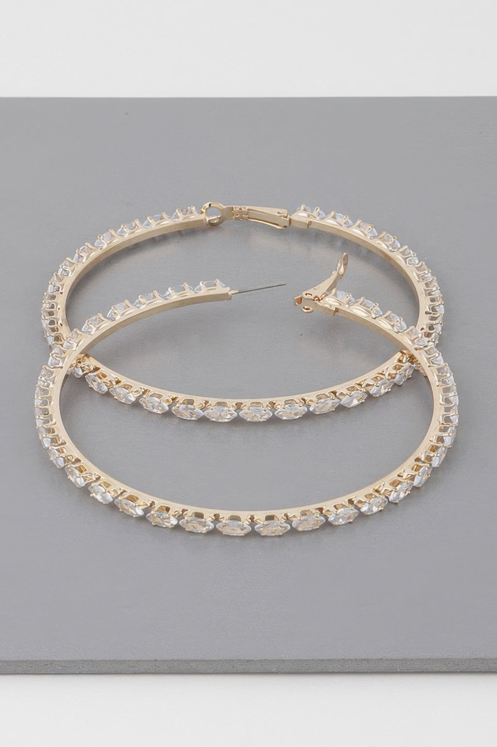 Teardrop jeweled hoop earrings, gold-tone with clear stones