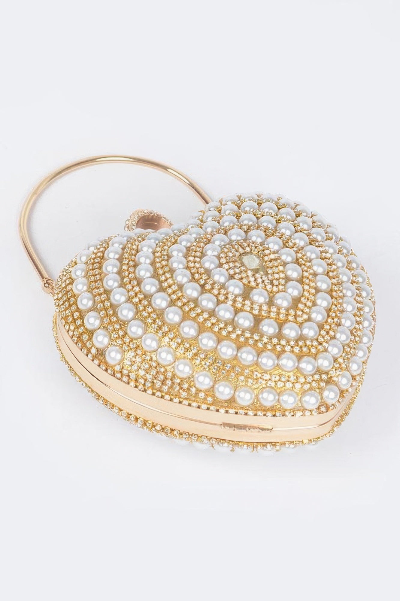 Heart Shape Party Clutch in gold with pearl bead swirl design and chain strap