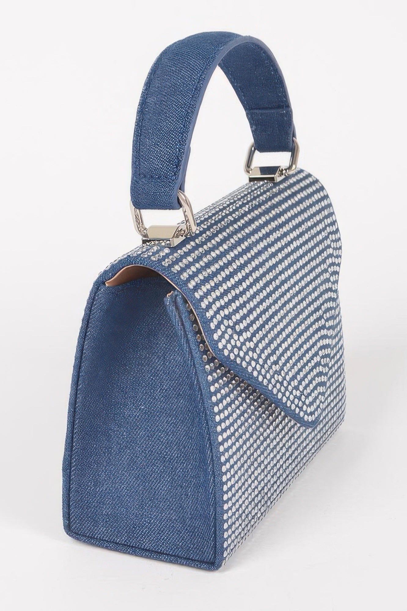 Dark blue hot-fix stone top handle bag with silver dot pattern and structured top, side profile