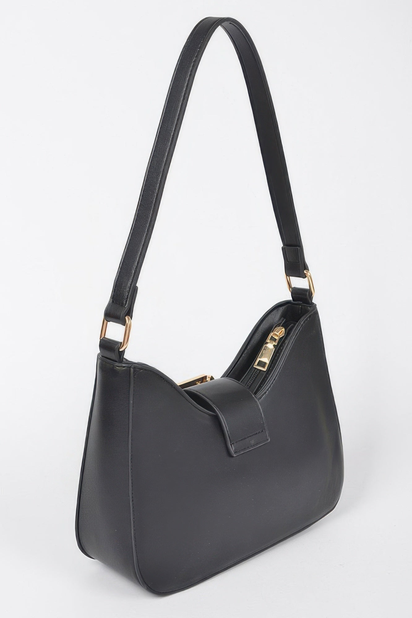 Black faux leather shoulder bag with wide strap, structured body, and studded front