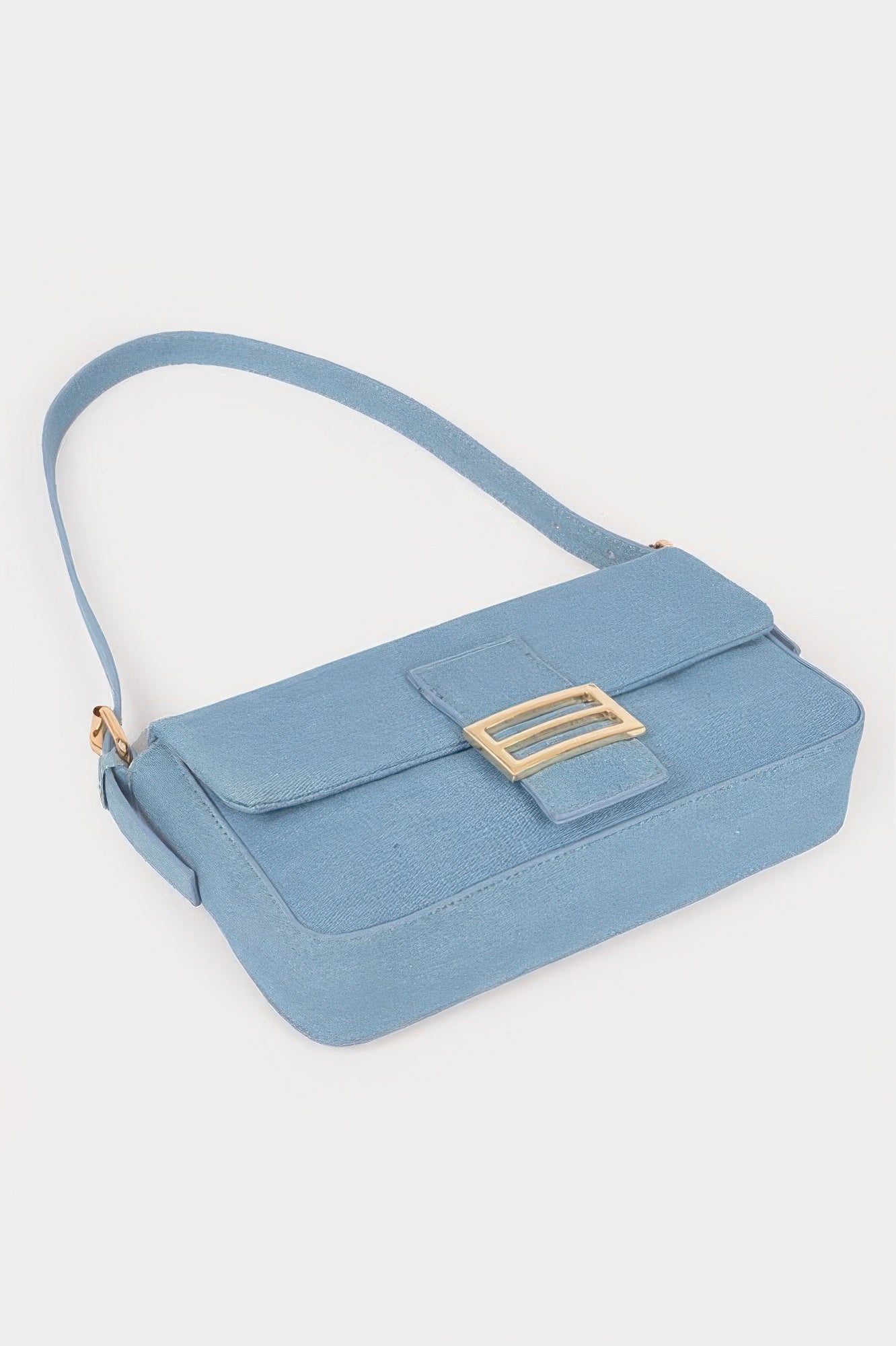Light blue denim shoulder bag with top flap and gold-tone buckle accent