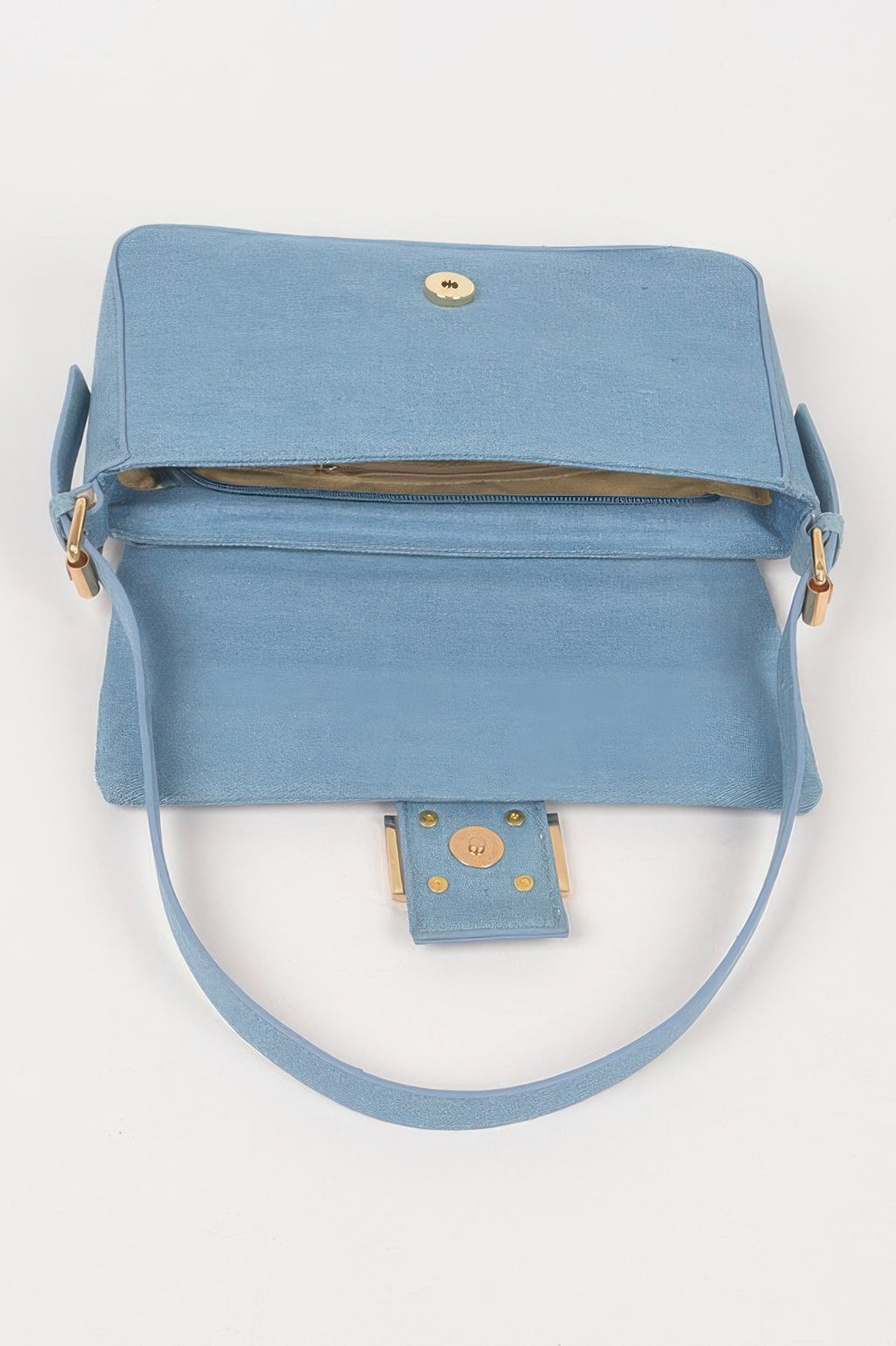 Light blue denim shoulder bag, top view with flap pocket and small hanging tab