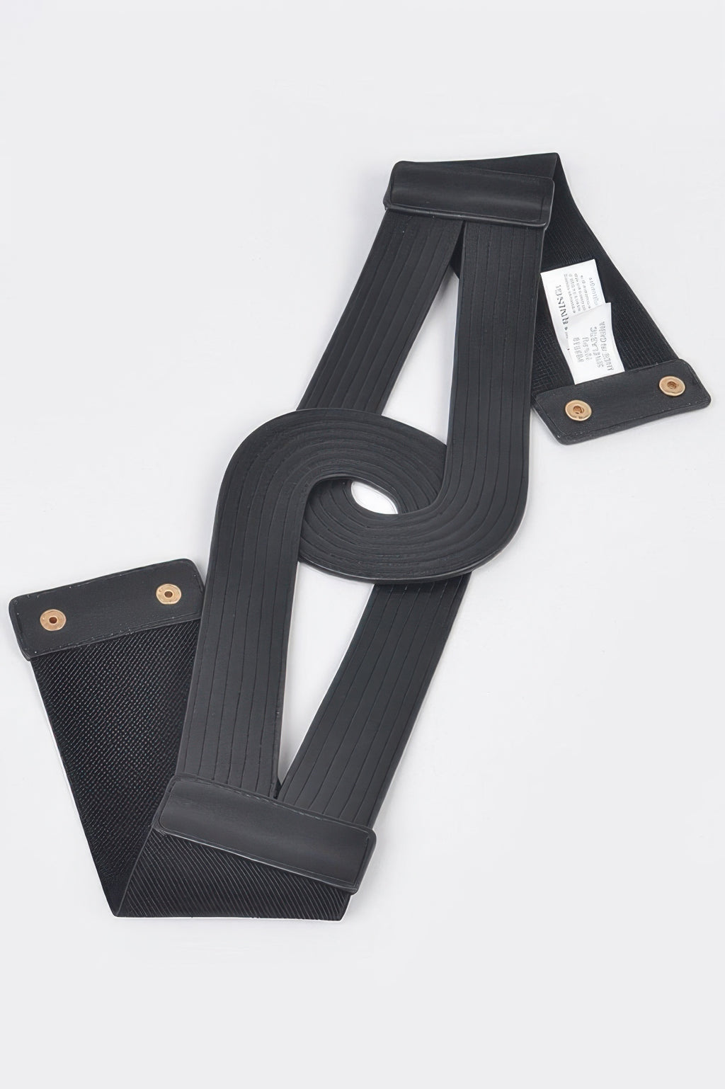 Black faux leather elastic belt with woven texture, end tabs, and gold-toned snaps.