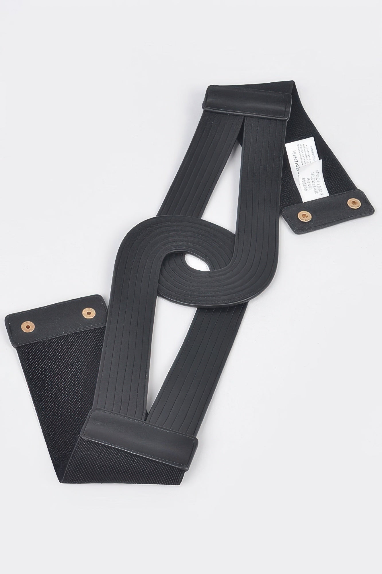 Black faux leather elastic belt with woven texture, end tabs, and gold-toned snaps.