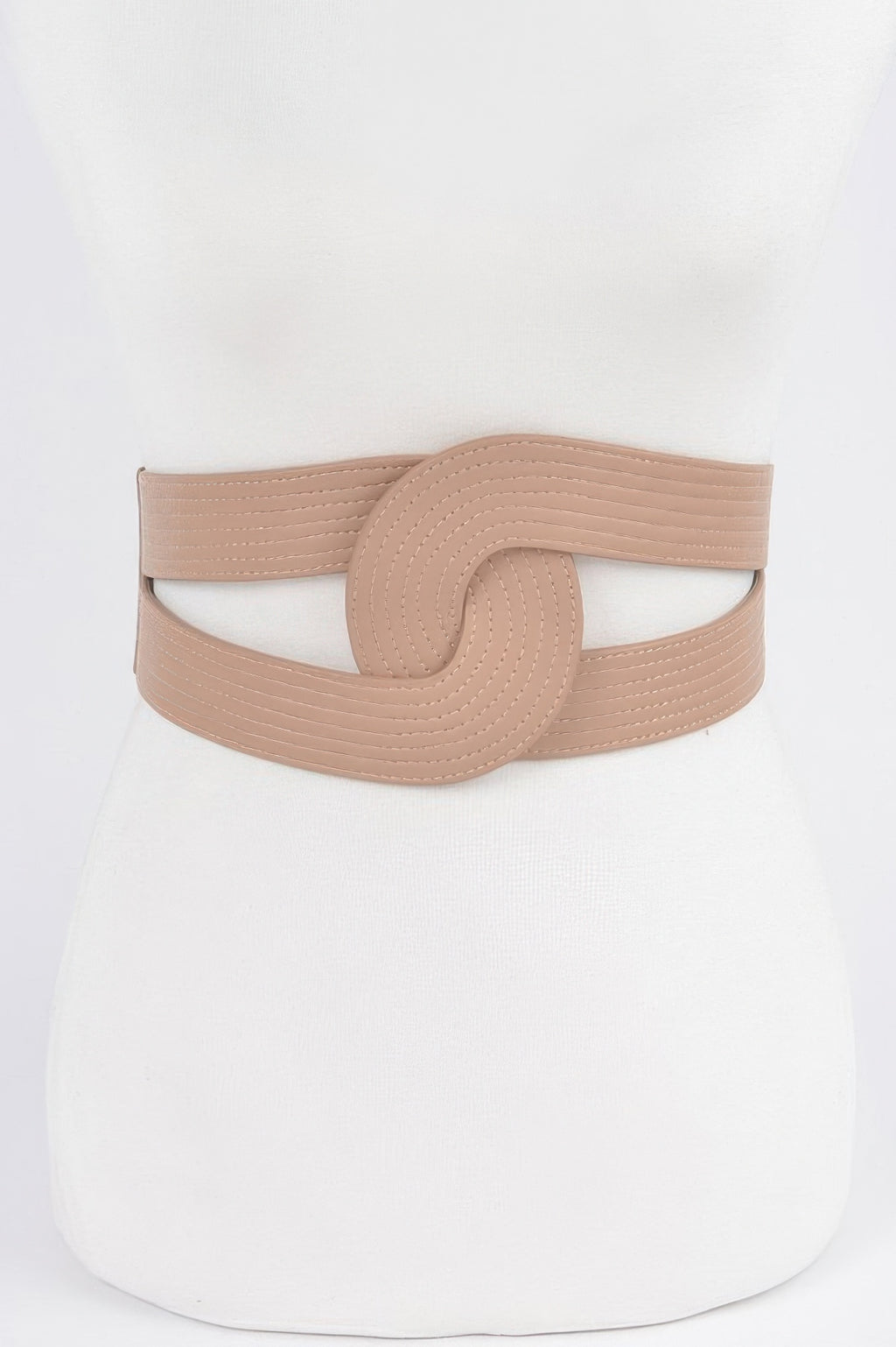Nude faux leather elastic belt with circular center buckle, textured band, one size.