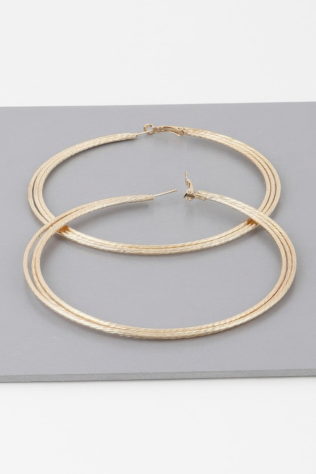 Wide Triple Rope Hoop Earrings, gold tone, two large intertwined hoops with clasp