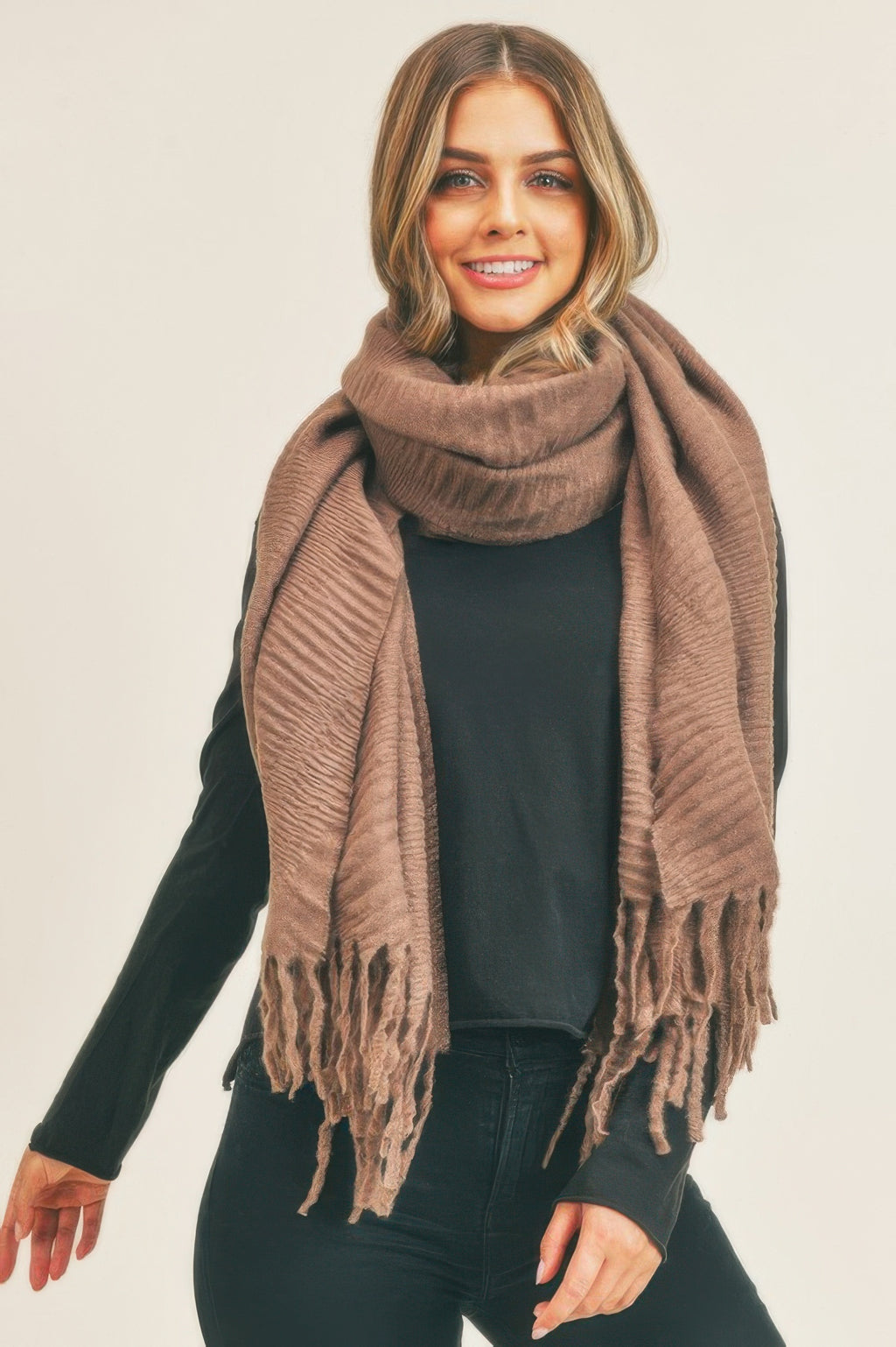 Solid pleated scarf in brown with fringed ends