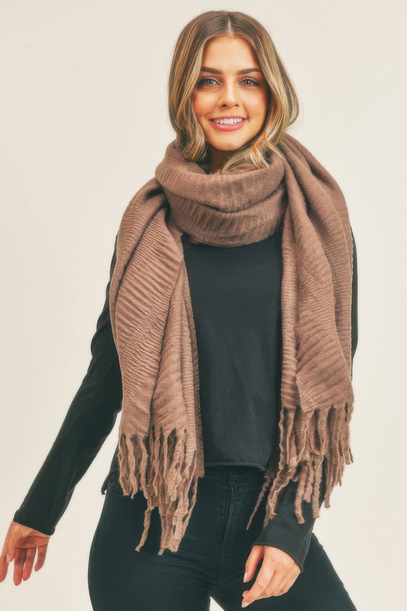 Solid pleated scarf in brown with fringed ends