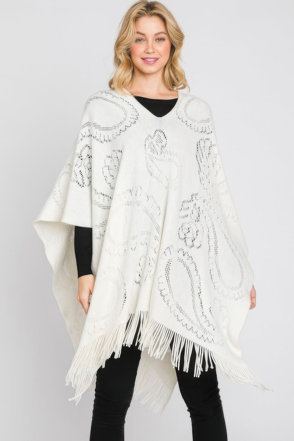 Paisley Pattern Fringe Poncho in Ivory, draped shawl style with fringe at the hem.