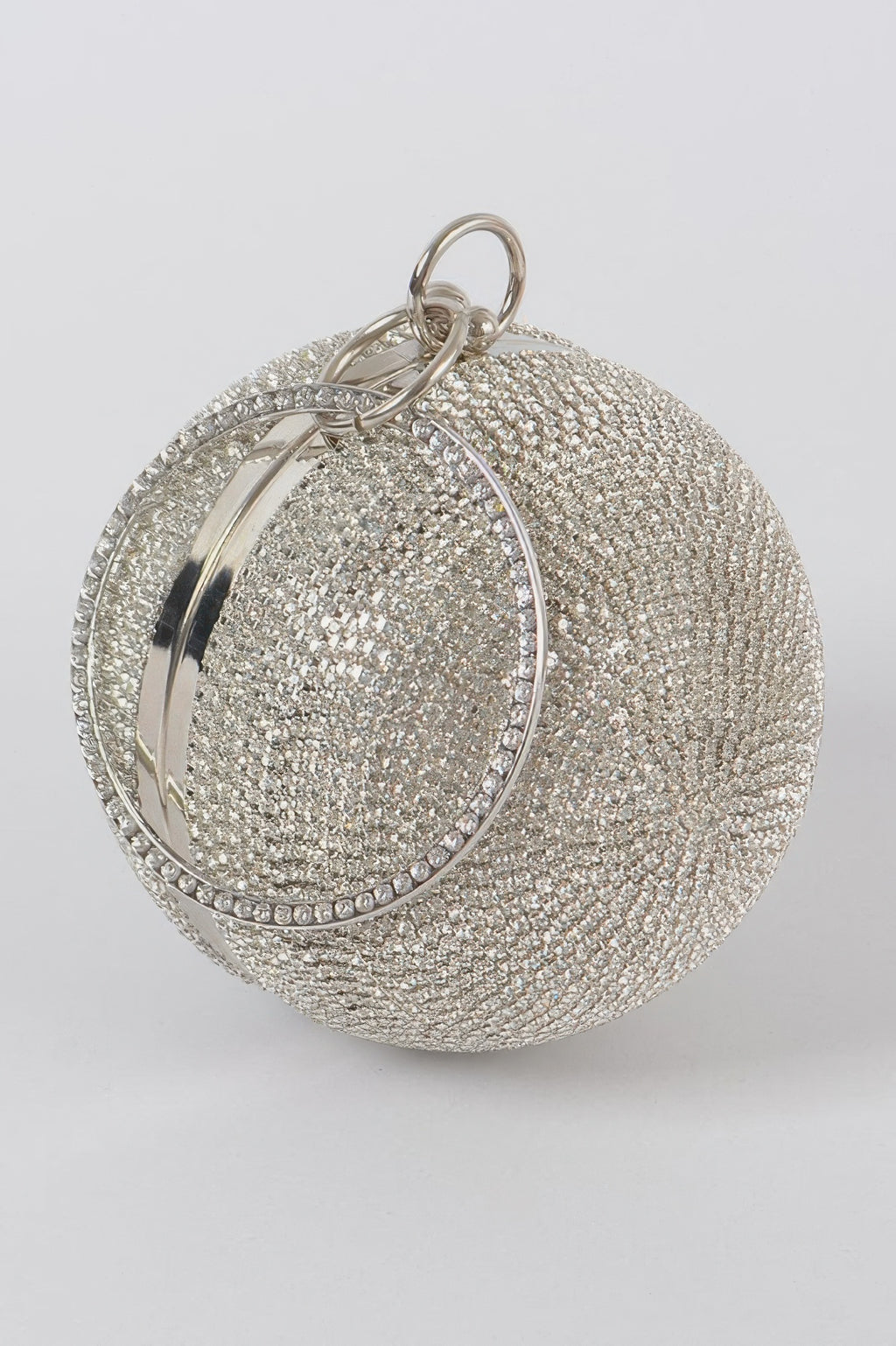 Silver rhinestone ball clutch close-up of oval clasp detail and beadwork