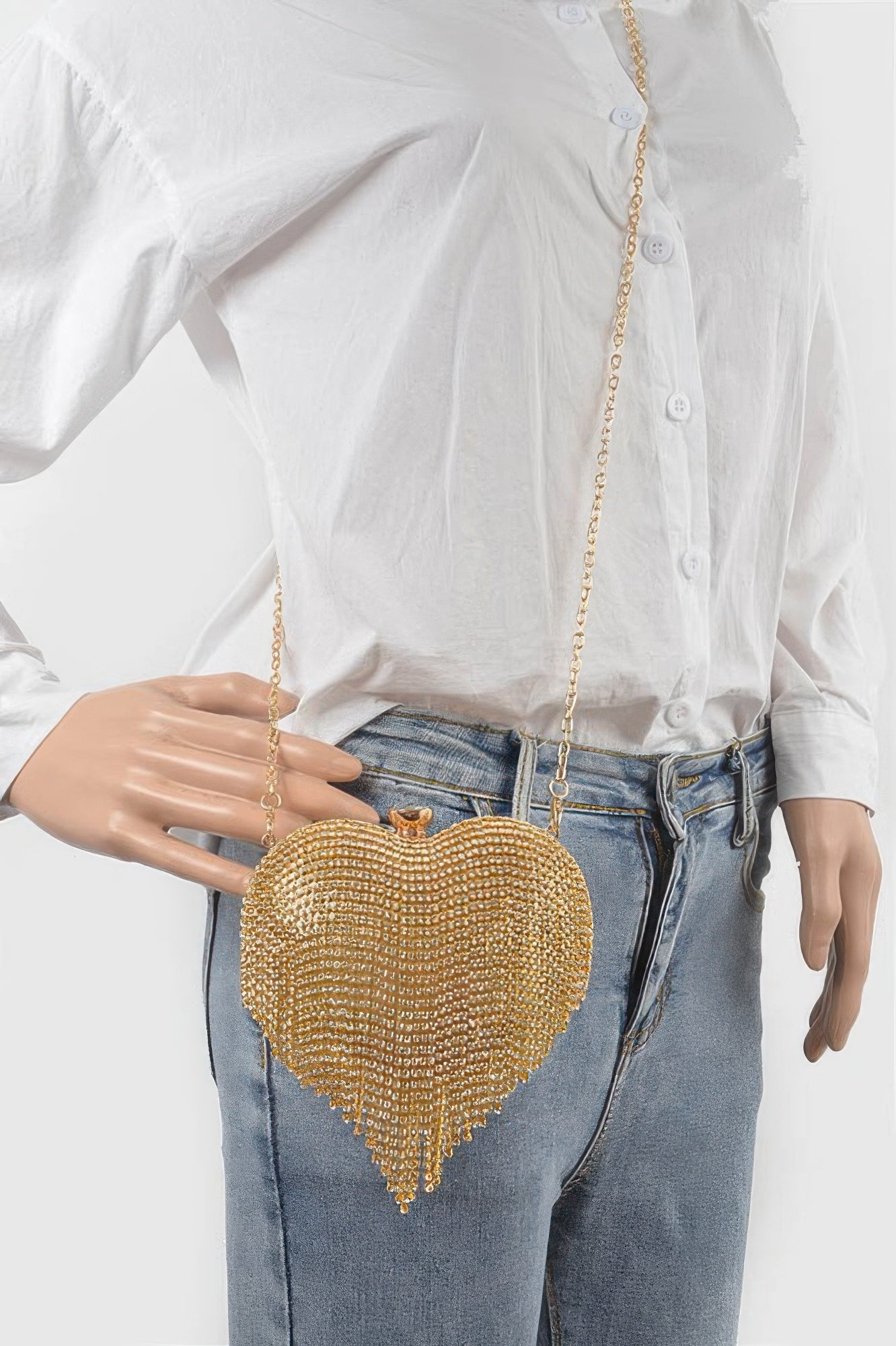 Gold rhinestone heart mini bag on chain strap, fringe-style drop