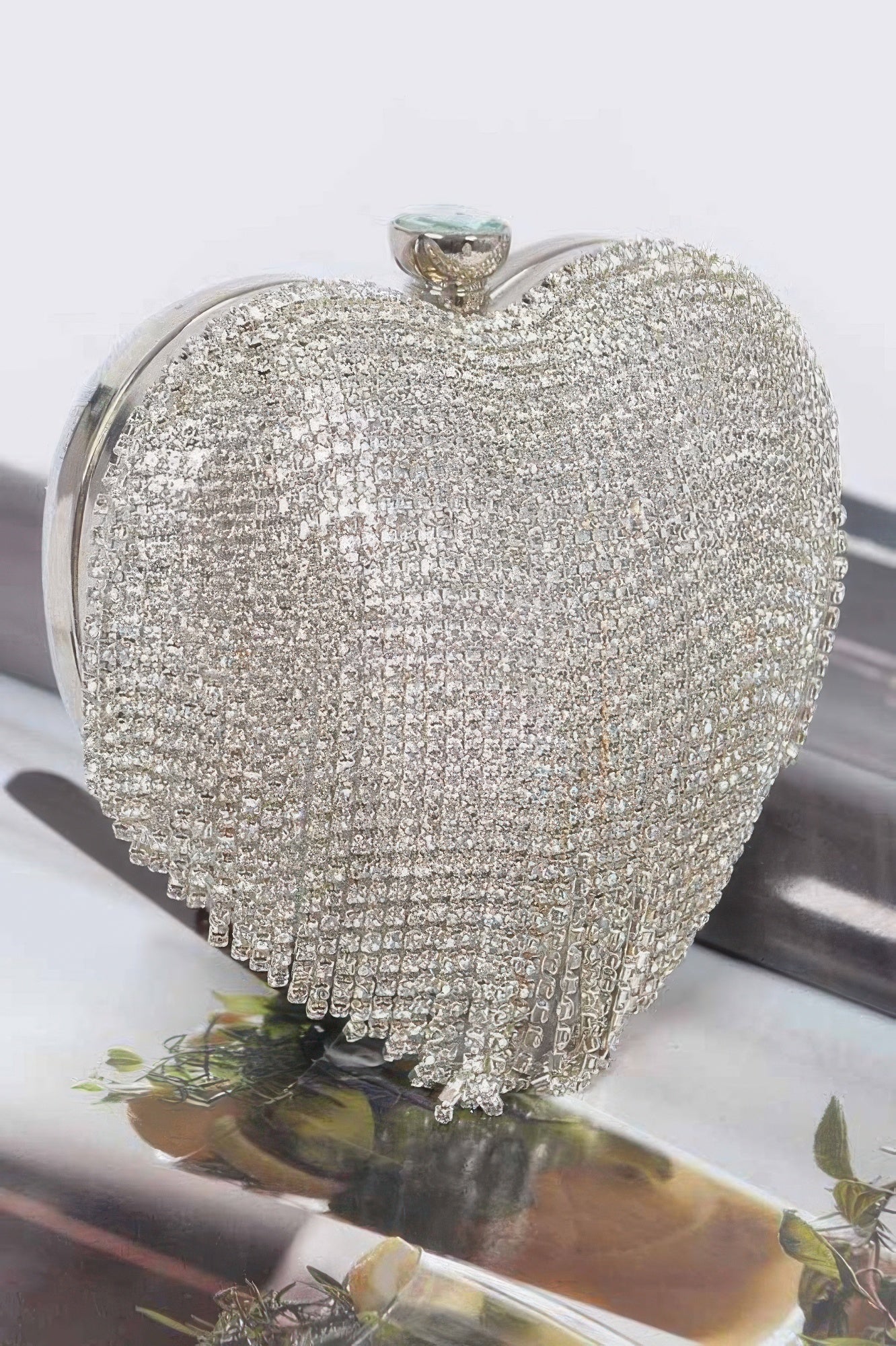 Silver rhinestone heart mini case bag, front view with top clasp