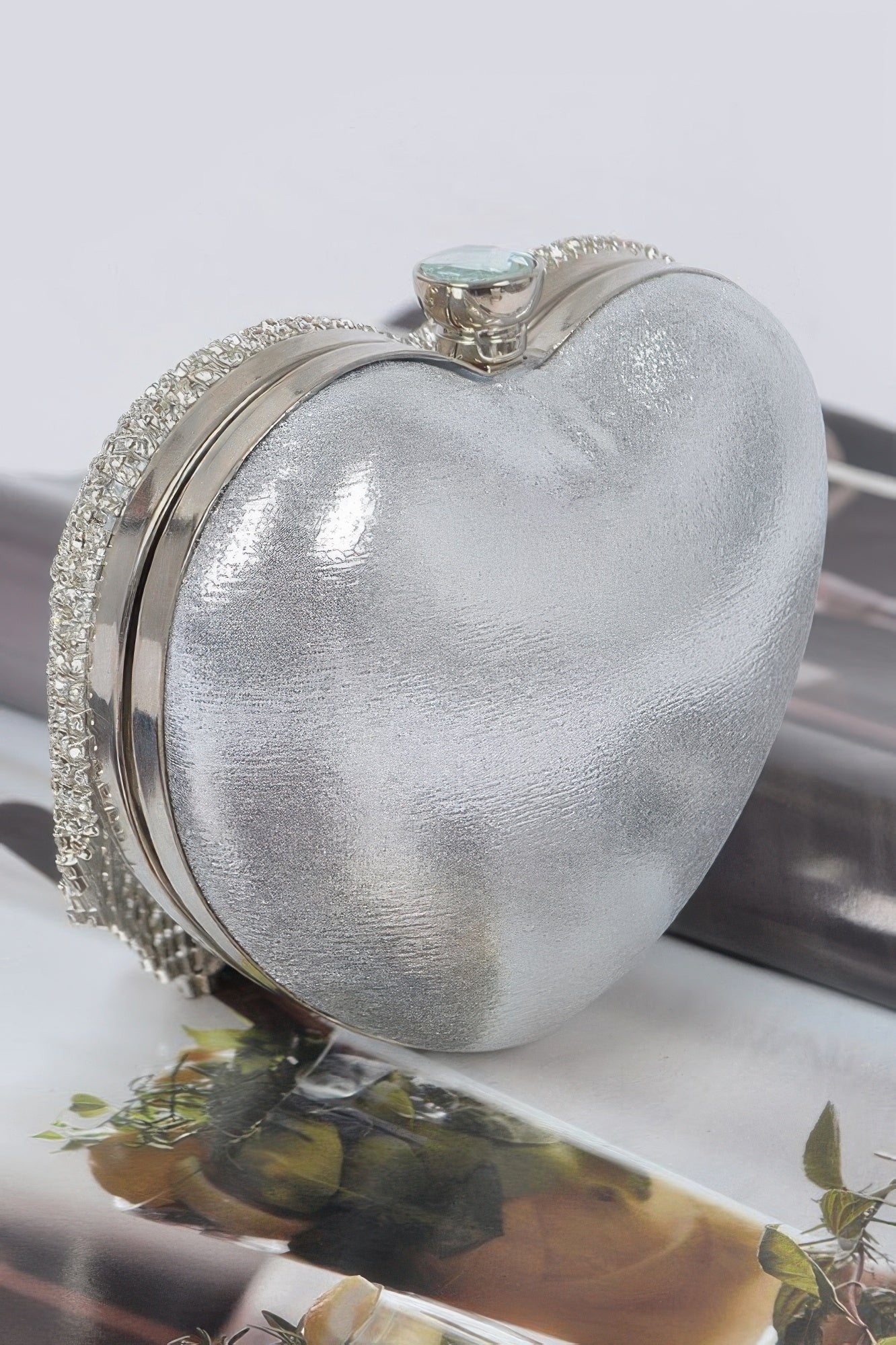 Silver rhinestone heart mini case bag with curved metal frame