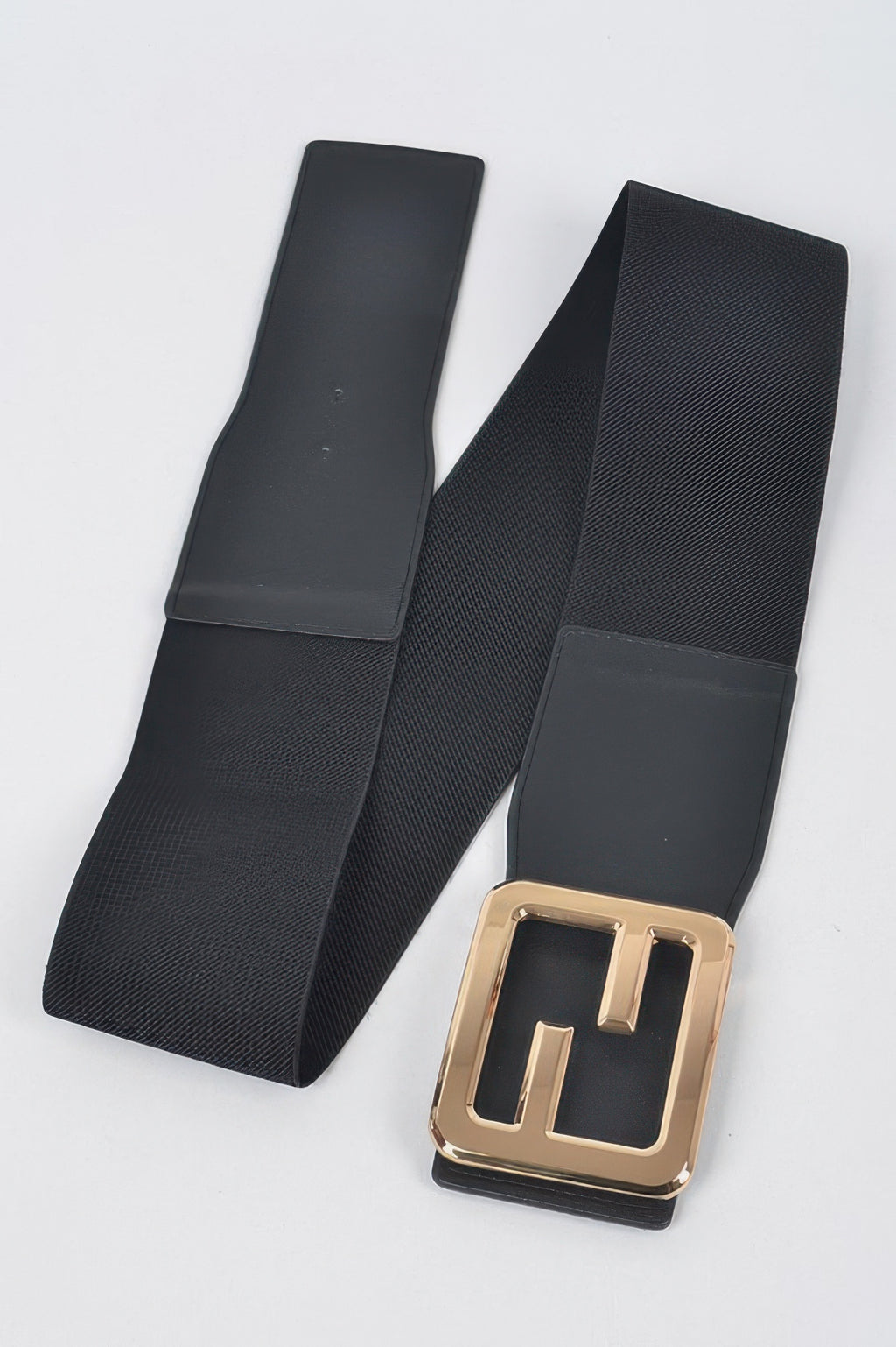 Black elastic plus-size belt with E-shaped gold buckle on end straps