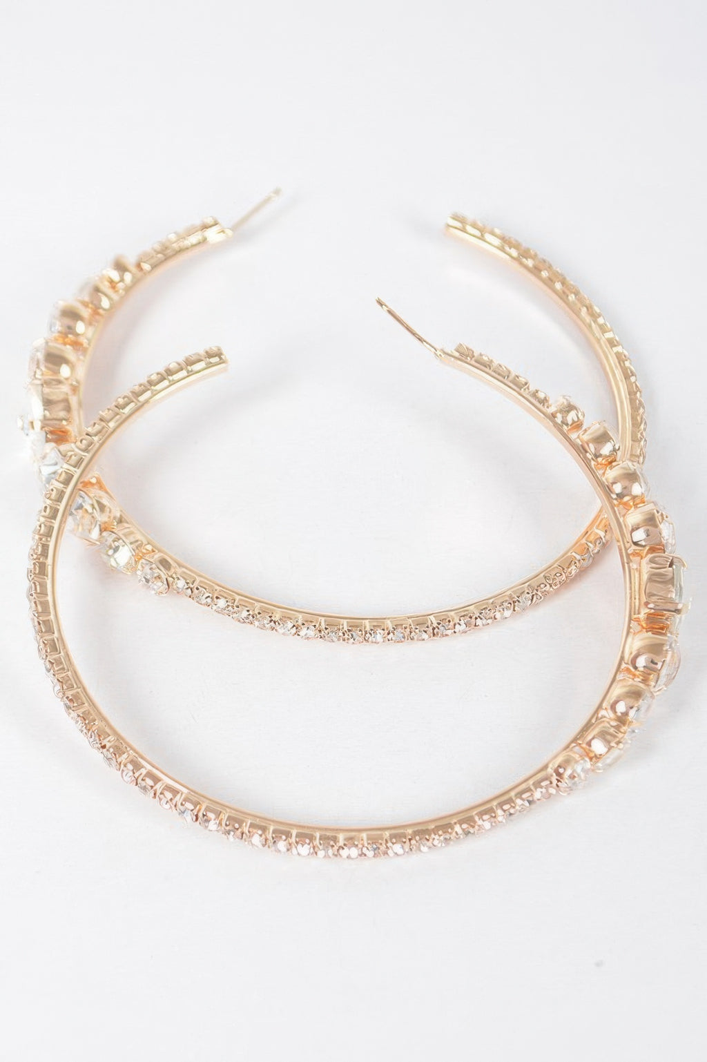 Rhinestone hoop earrings, clear gold with rows of clear sparkling stones