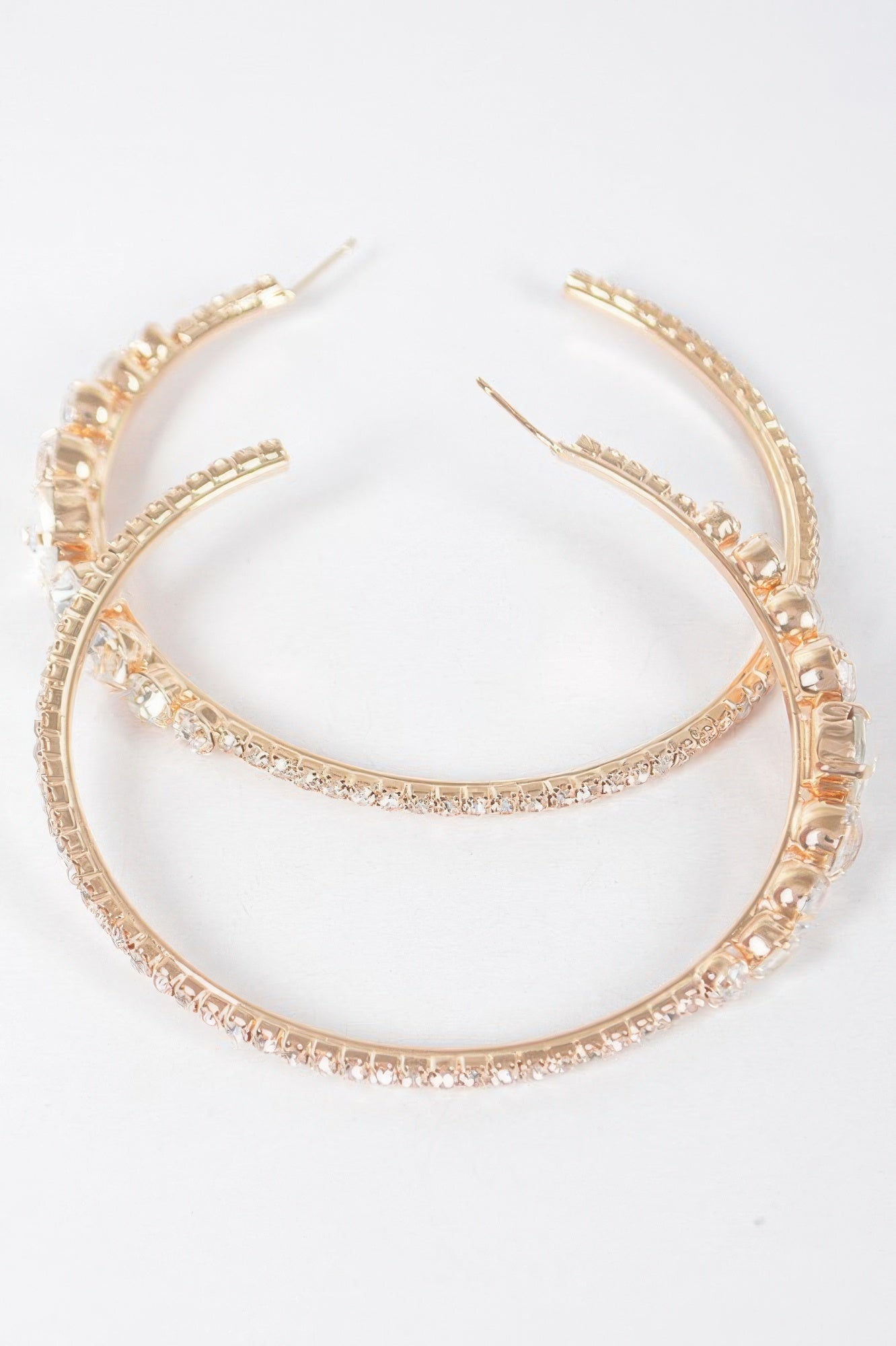 Rhinestone hoop earrings, clear gold with rows of clear sparkling stones