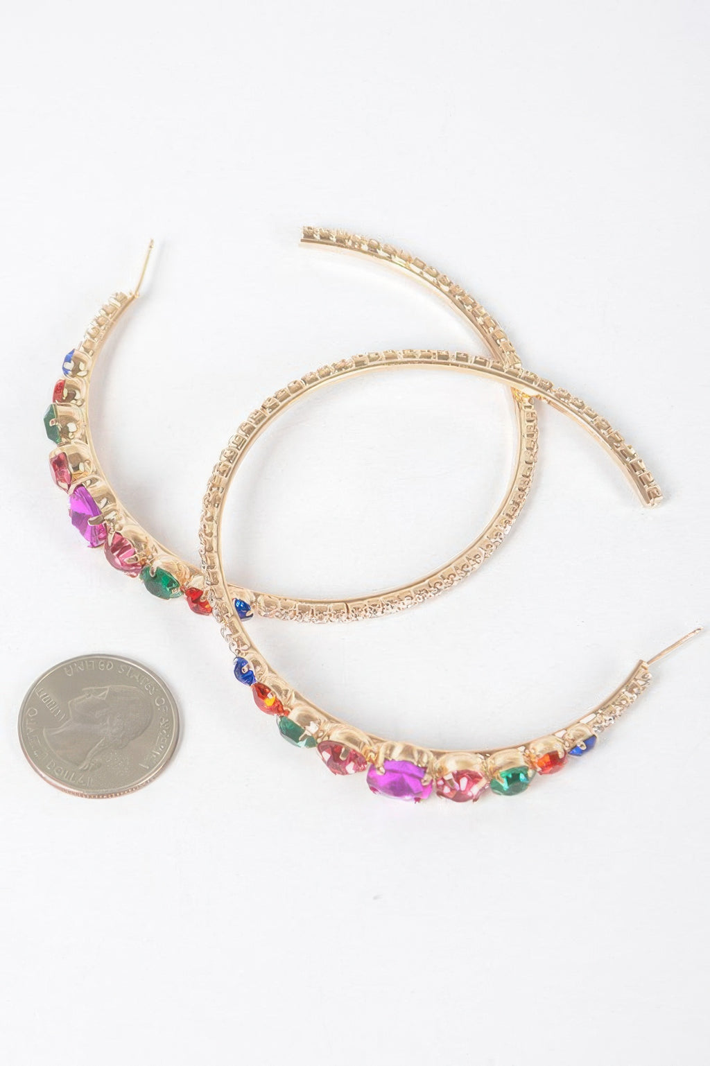 Rhinestone hoop earrings, gold-tone with multicolor crystals along the hoop