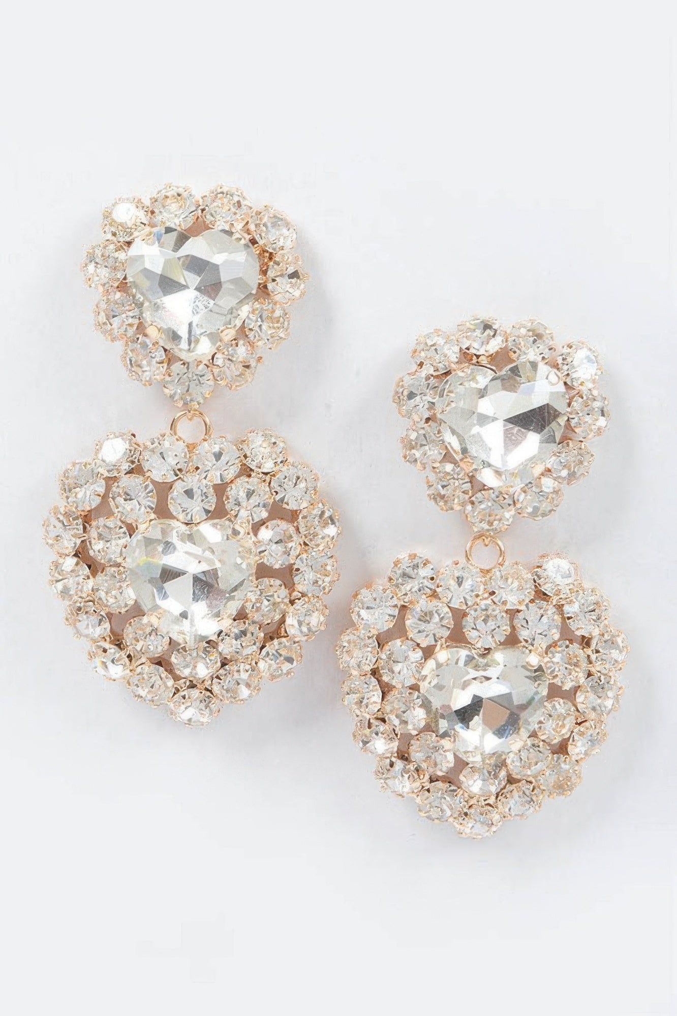 Heart stone earrings with clear faceted heart dangles in crystal settings