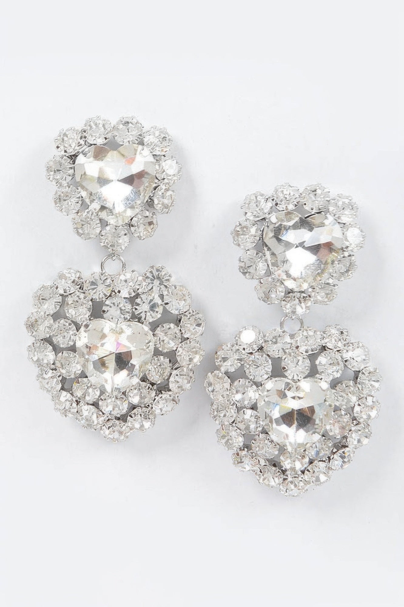 Heart stone earrings with clear faceted hearts and sparkling crystal surround