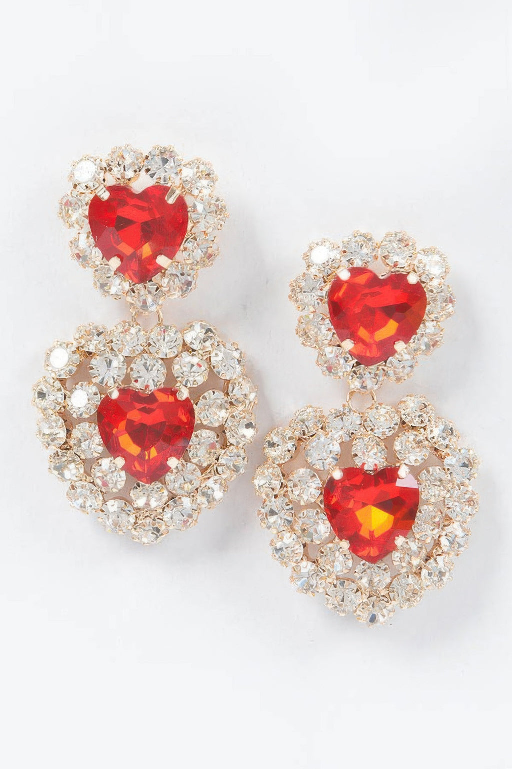 Heart stone earrings with red faceted heart centers and crystal halo dangles