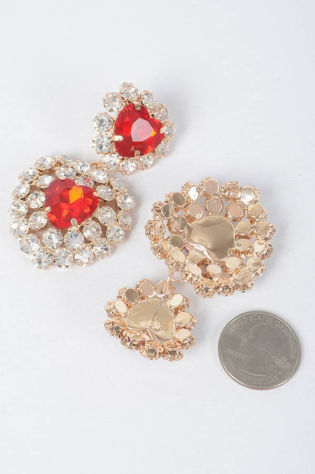 Heart stone earrings, red faceted hearts in gold-tone crystal bezels (back view)