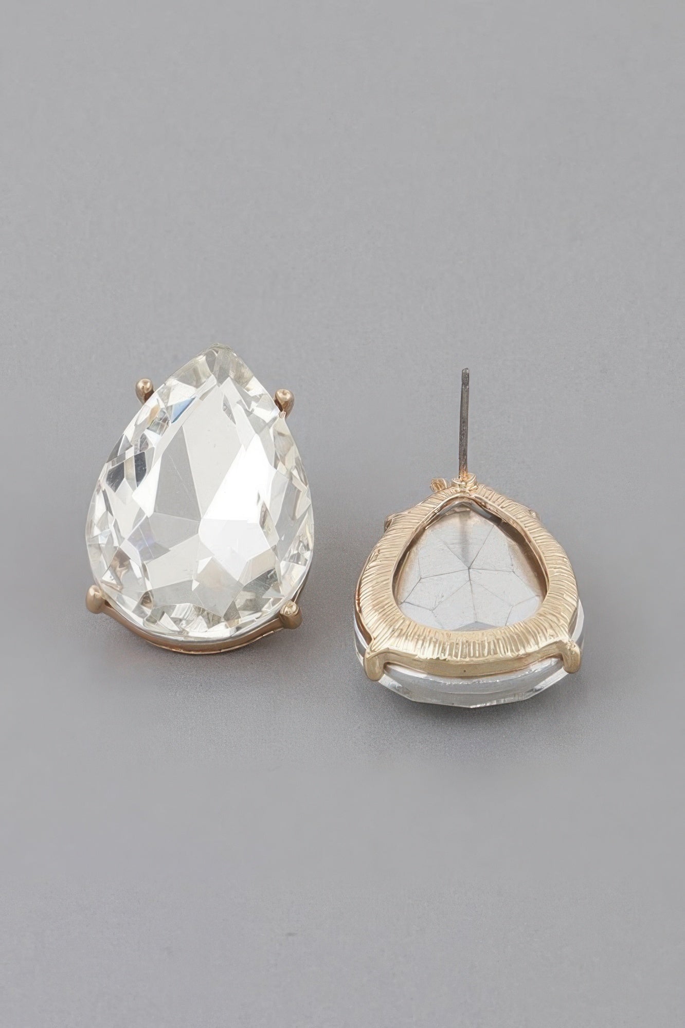 Teardrop crystal earrings (clear) with gold-tone setting, stud backs