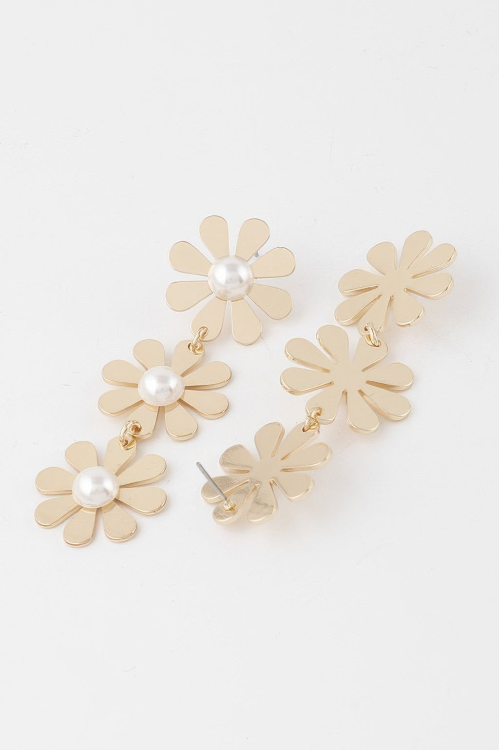 Long daisy drop earrings with cream layered petals and pearl beads, gold-tone hooks