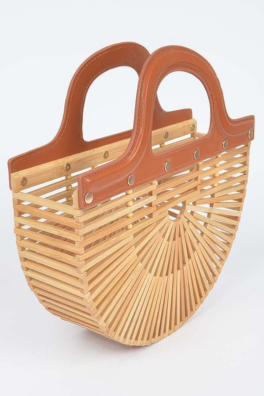 Bamboo top-handle bag, caramel leather straps and grommet details over slatted body