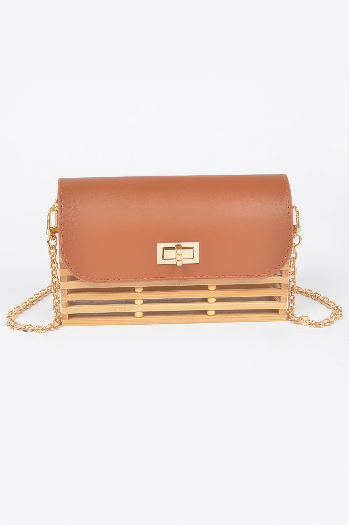 Bamboo flap crossbody bag in tan-brown with gold clasp and chain, slatted front