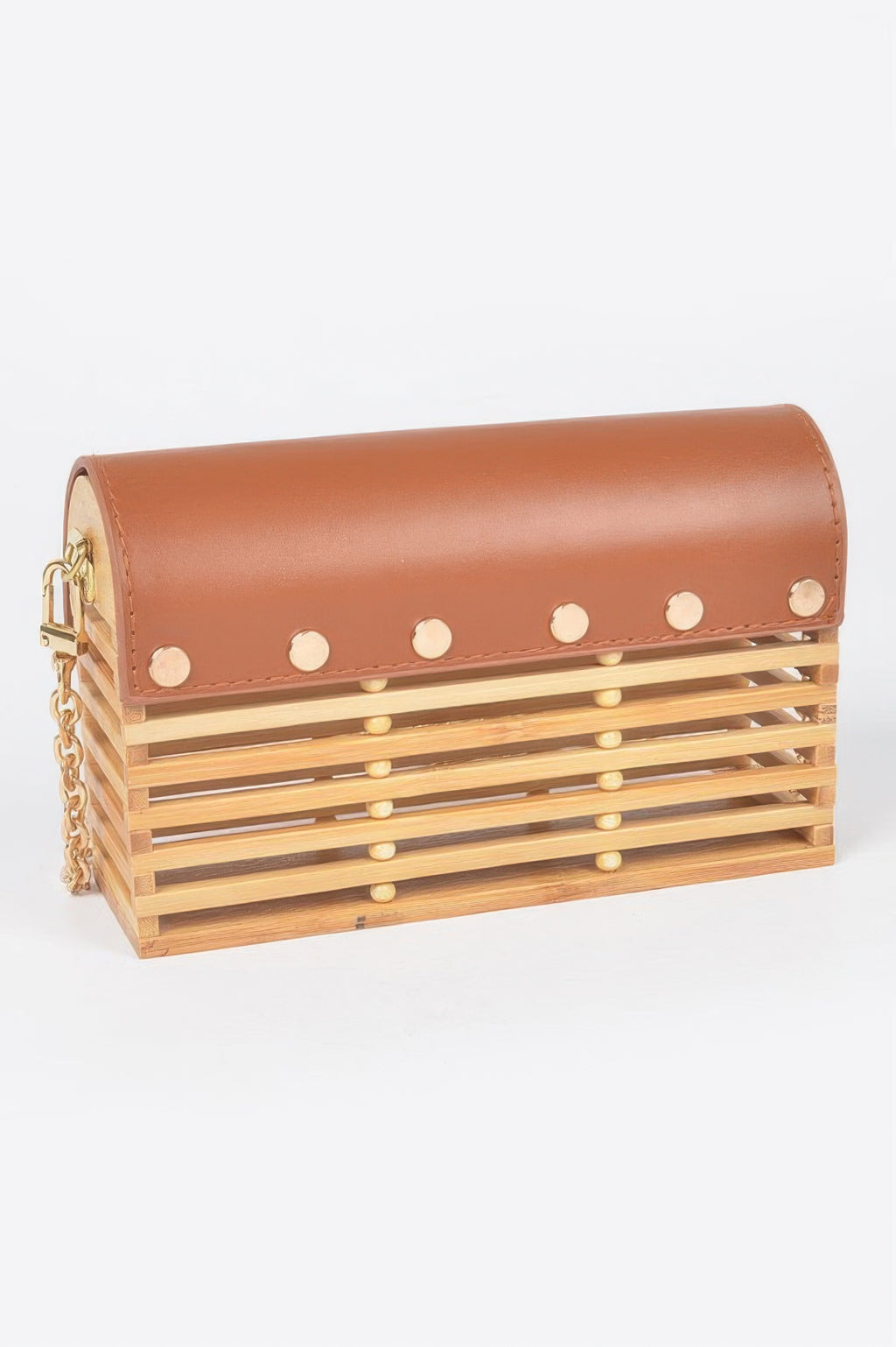 Tan-brown bamboo flap crossbody bag with gold hardware and round studs on the front