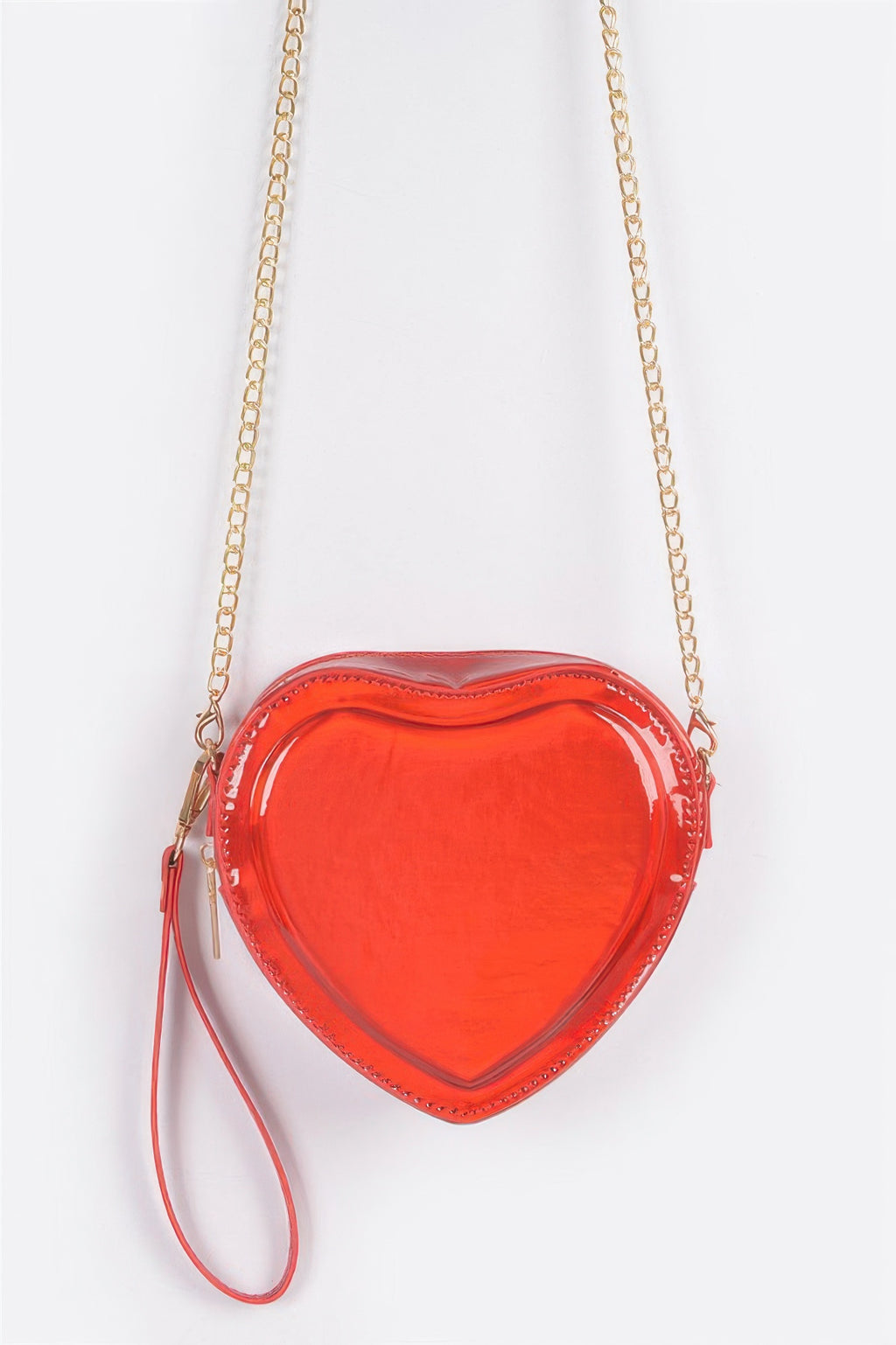 Heart-shaped metallic crossbody bag in red with gold chain strap and wristlet pull