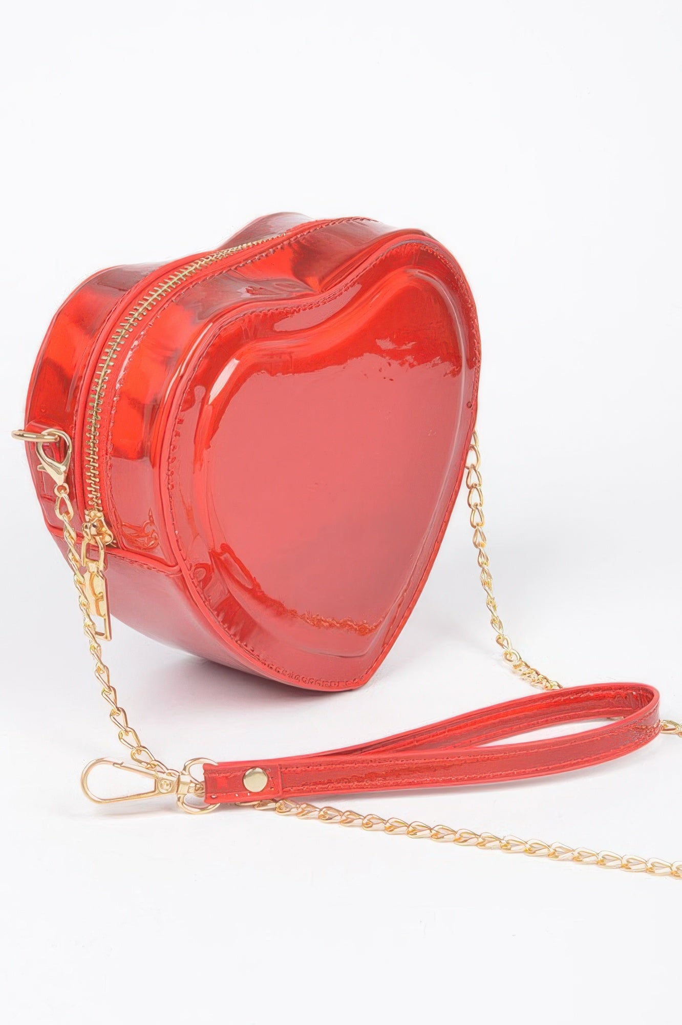 Red heart crossbody bag, glossy metallic finish, front zipper and gold chain strap