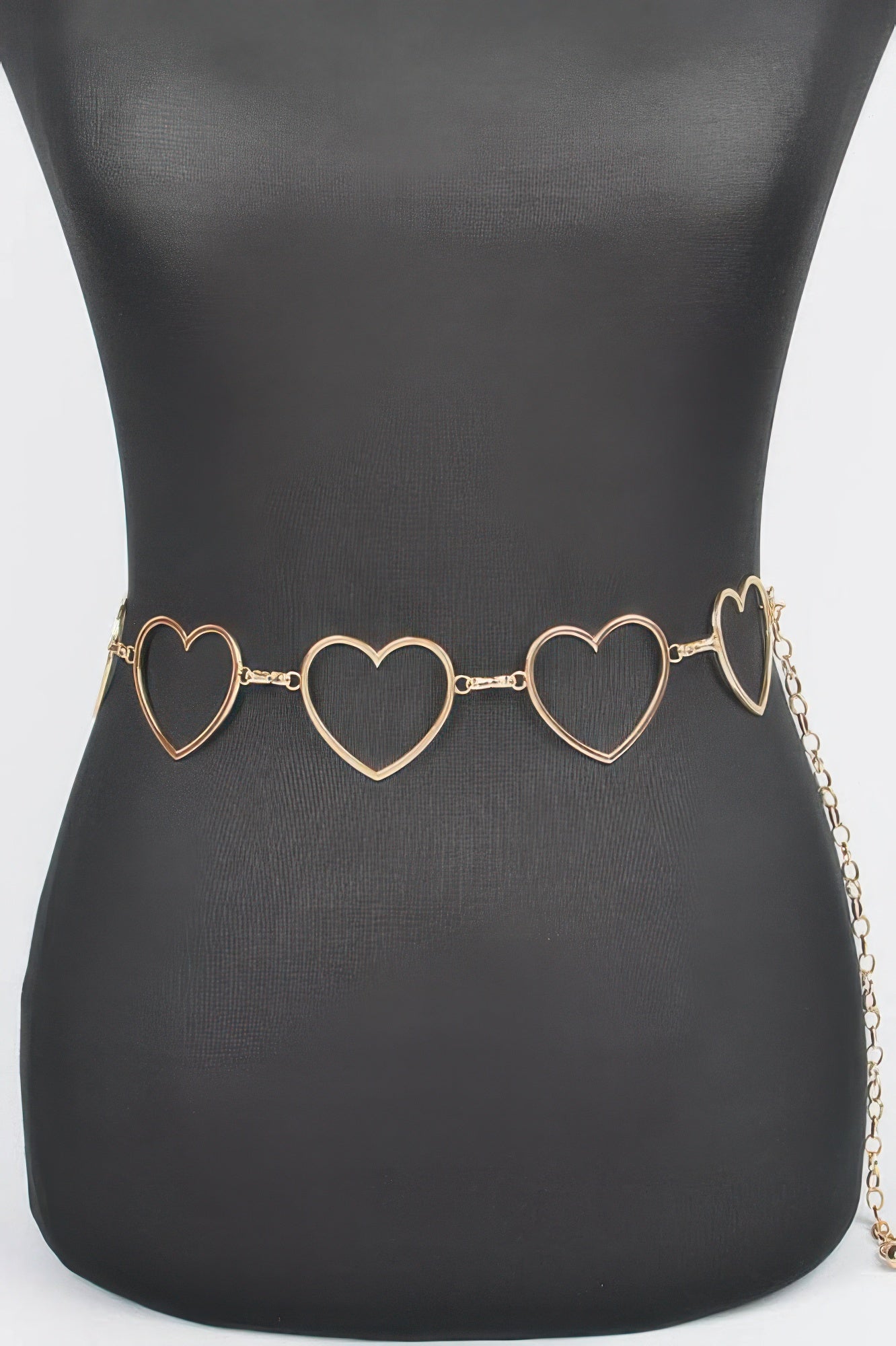 Heart chain belt with three gold heart links on black waist, adjustable length