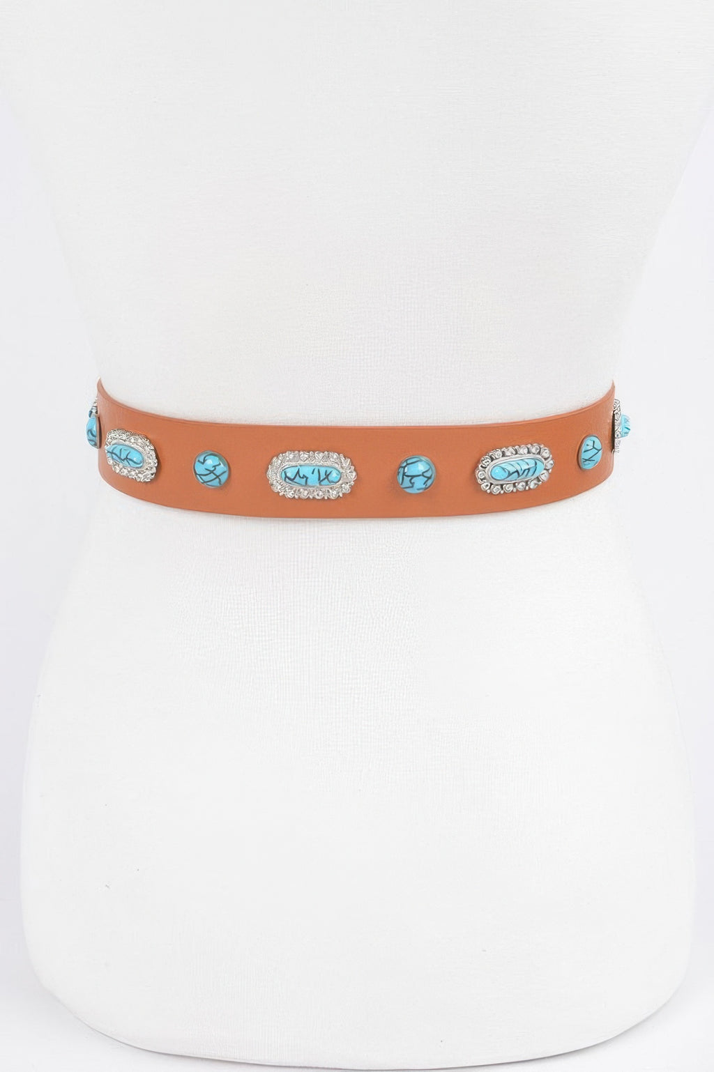 Camel western belt with turquoise emblem studs and oval silver concho decorations
